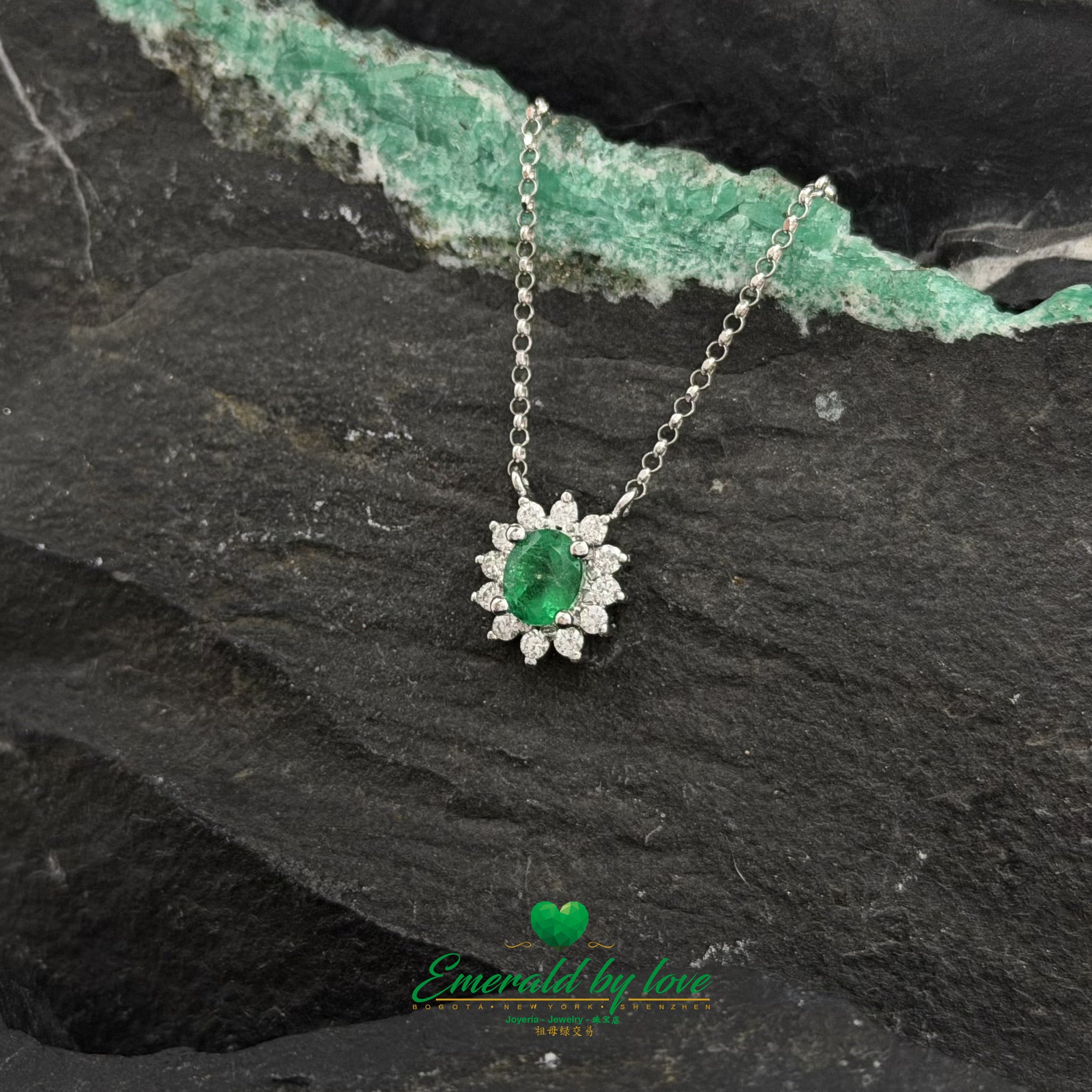 White Gold Floral Pendant with Oval Emerald and Diamonds