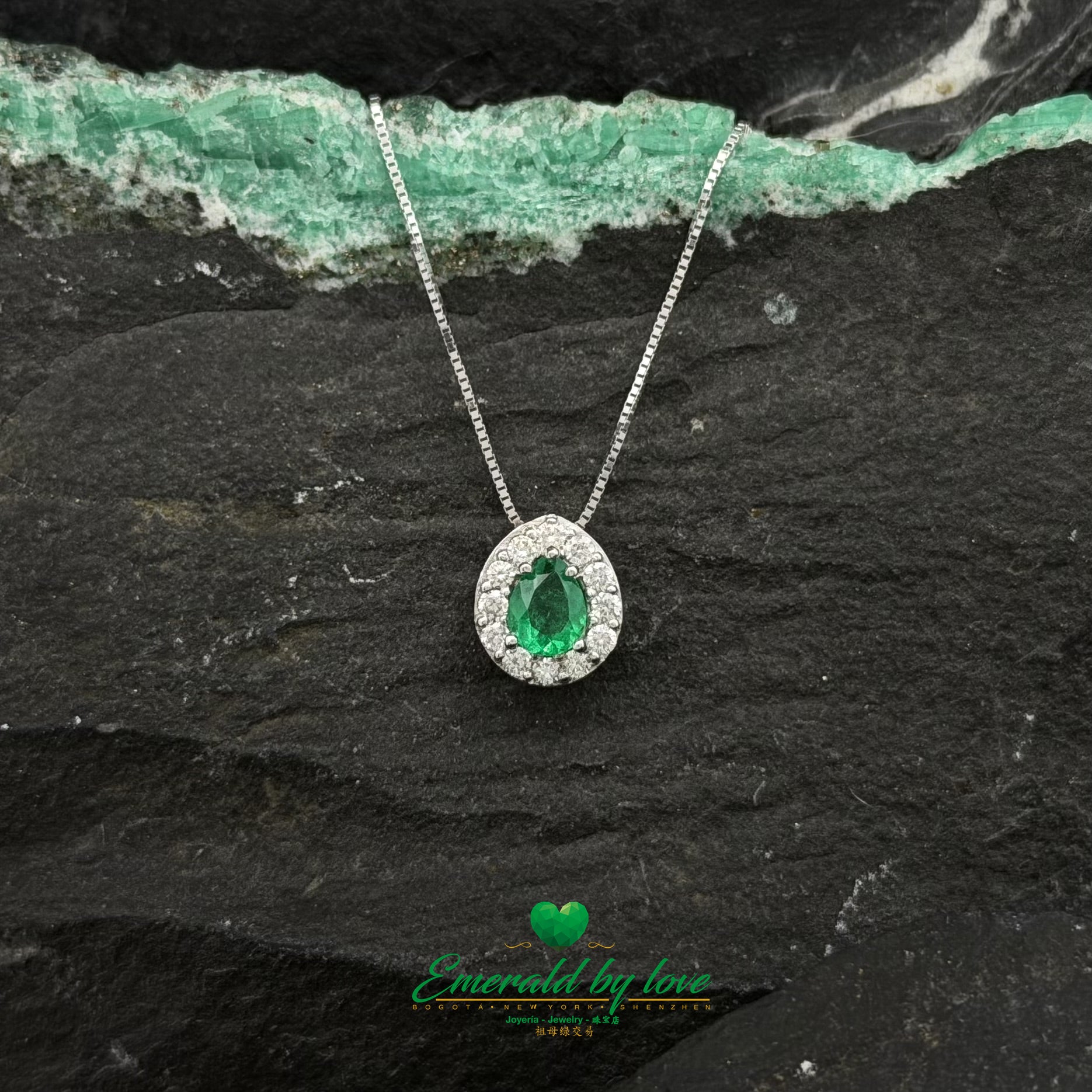 White Gold Cluster Pendant with Pear-Shaped Emerald and Diamonds