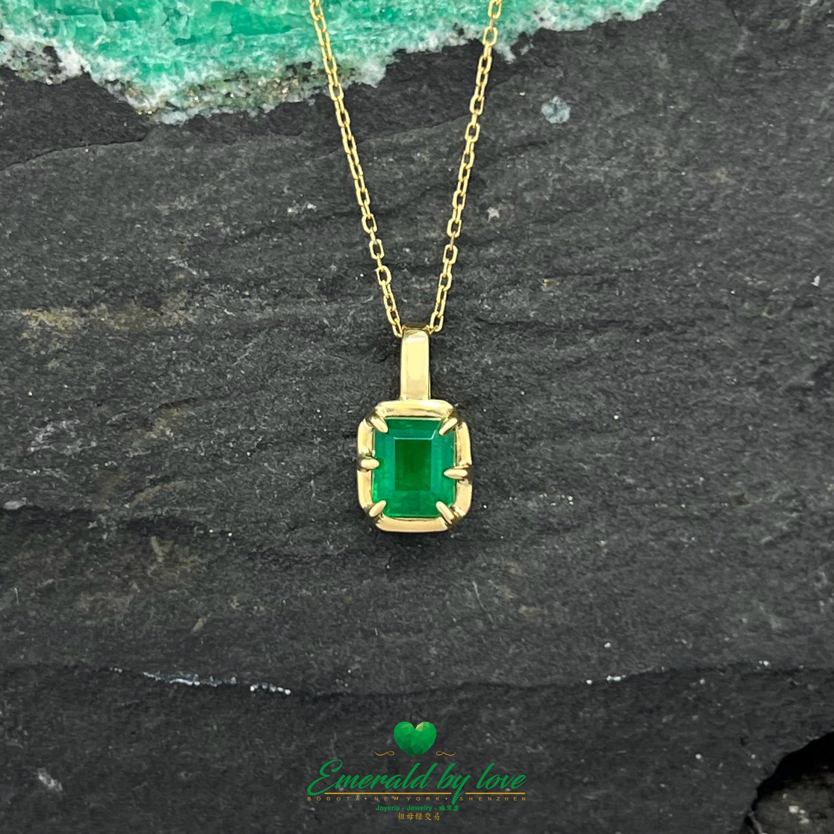 Sophisticated Yellow Gold Pendant with Rectangular Colombian Emerald and Bold Six-Prong Setting