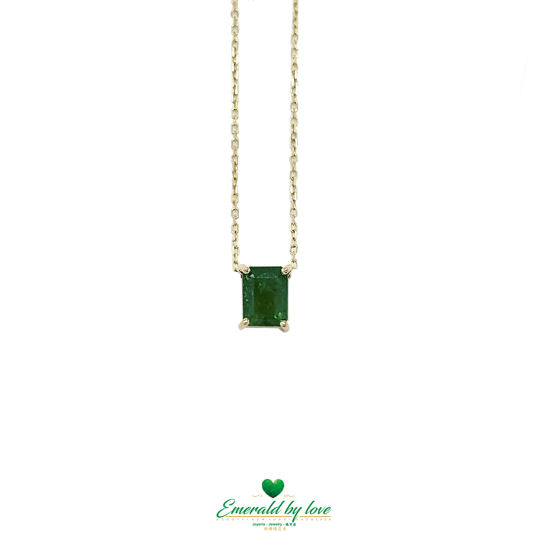 Colgante de oro amarillo de diseño singular con esmeralda rectangular de 1,07 ct