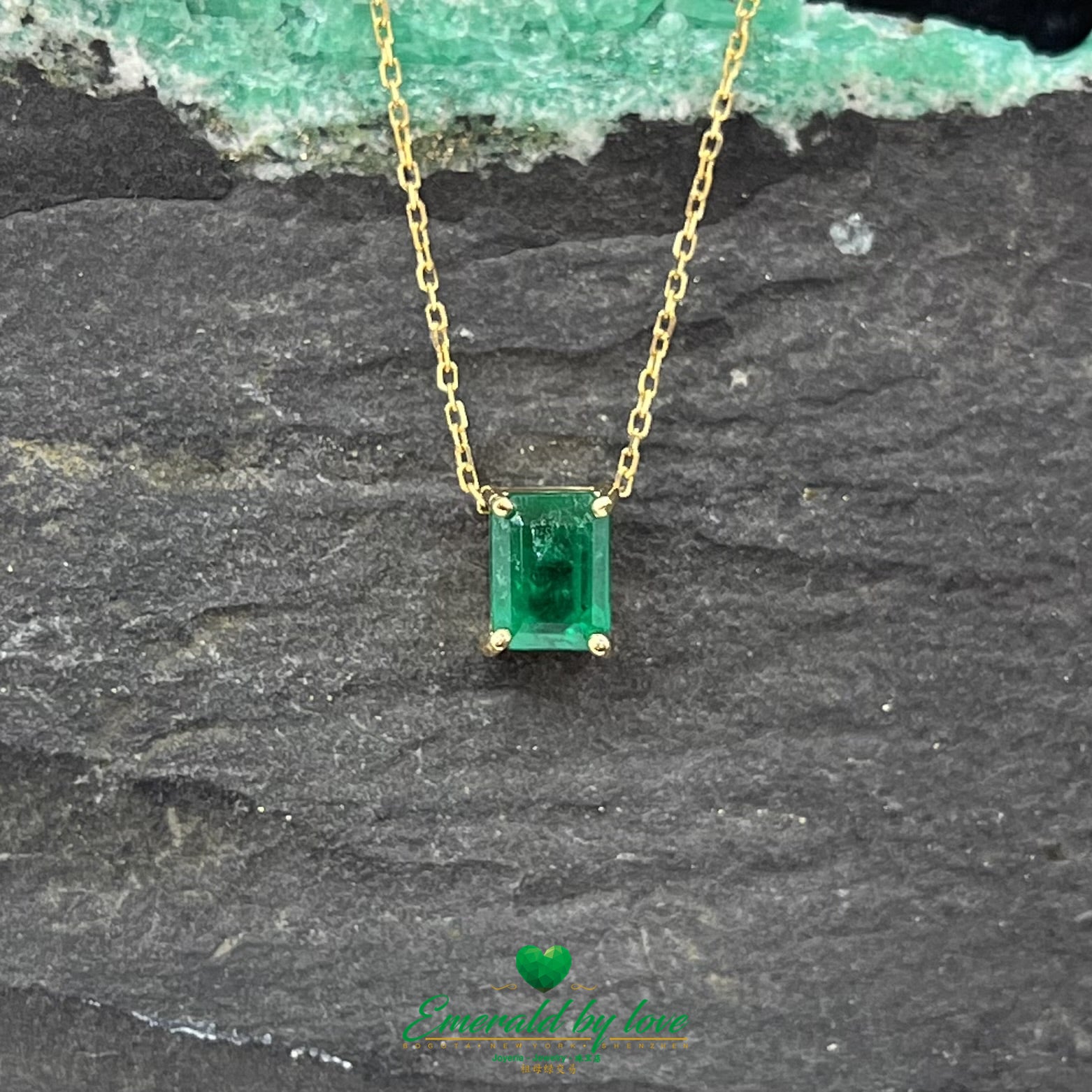 Singular Design Yellow Gold Pendant with 1.07ct Rectangular Emerald