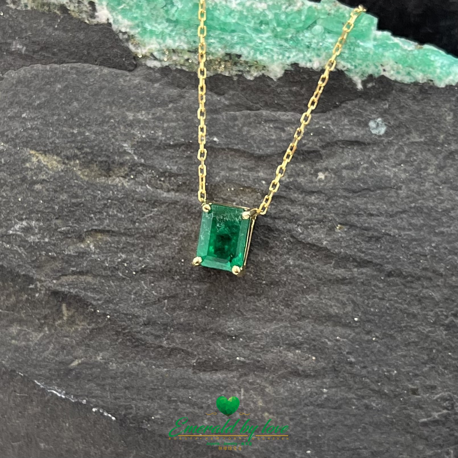 Singular Design Yellow Gold Pendant with 1.07ct Rectangular Emerald