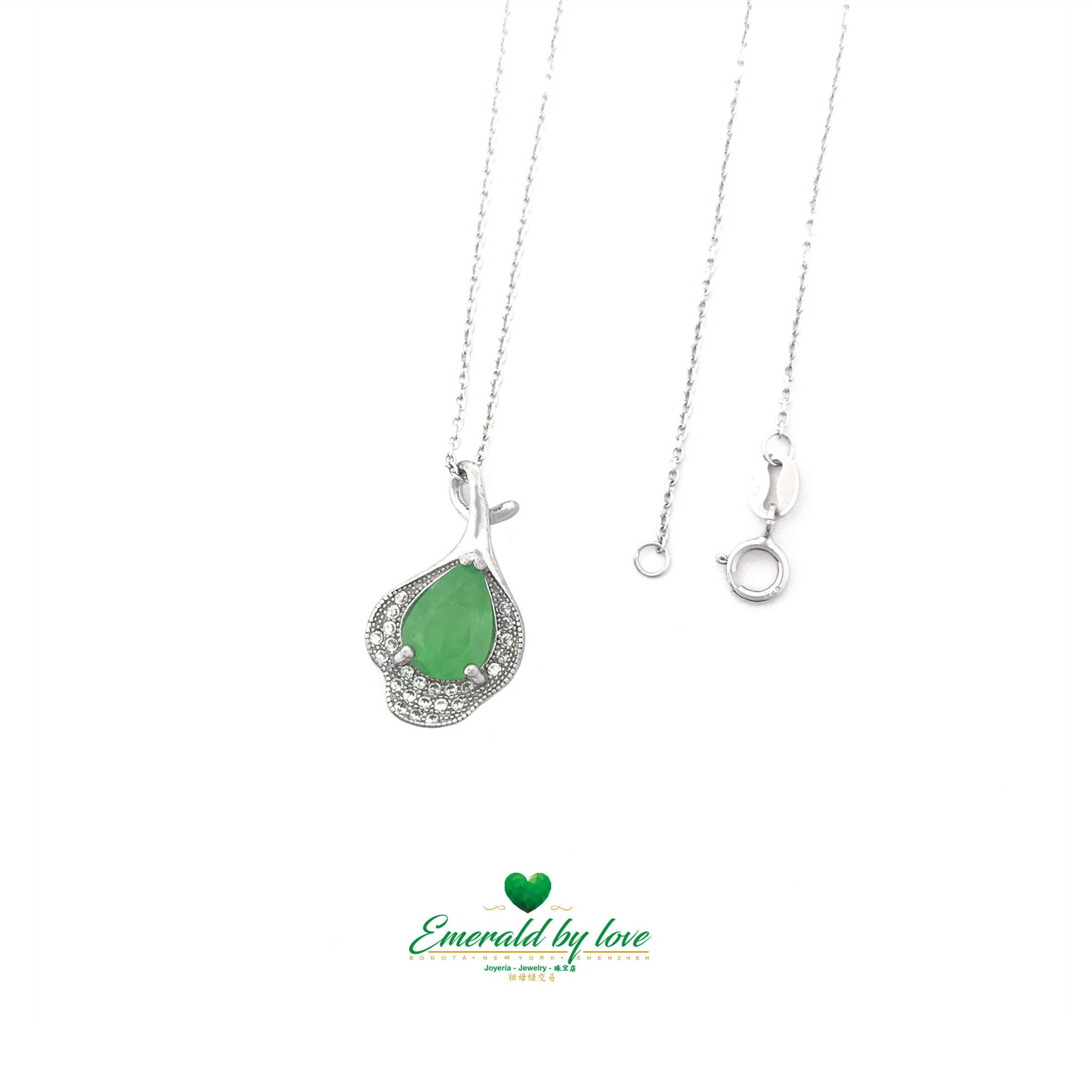 Vintage-Inspired Pendant with Pear-Shaped Emerald and Ornate Design