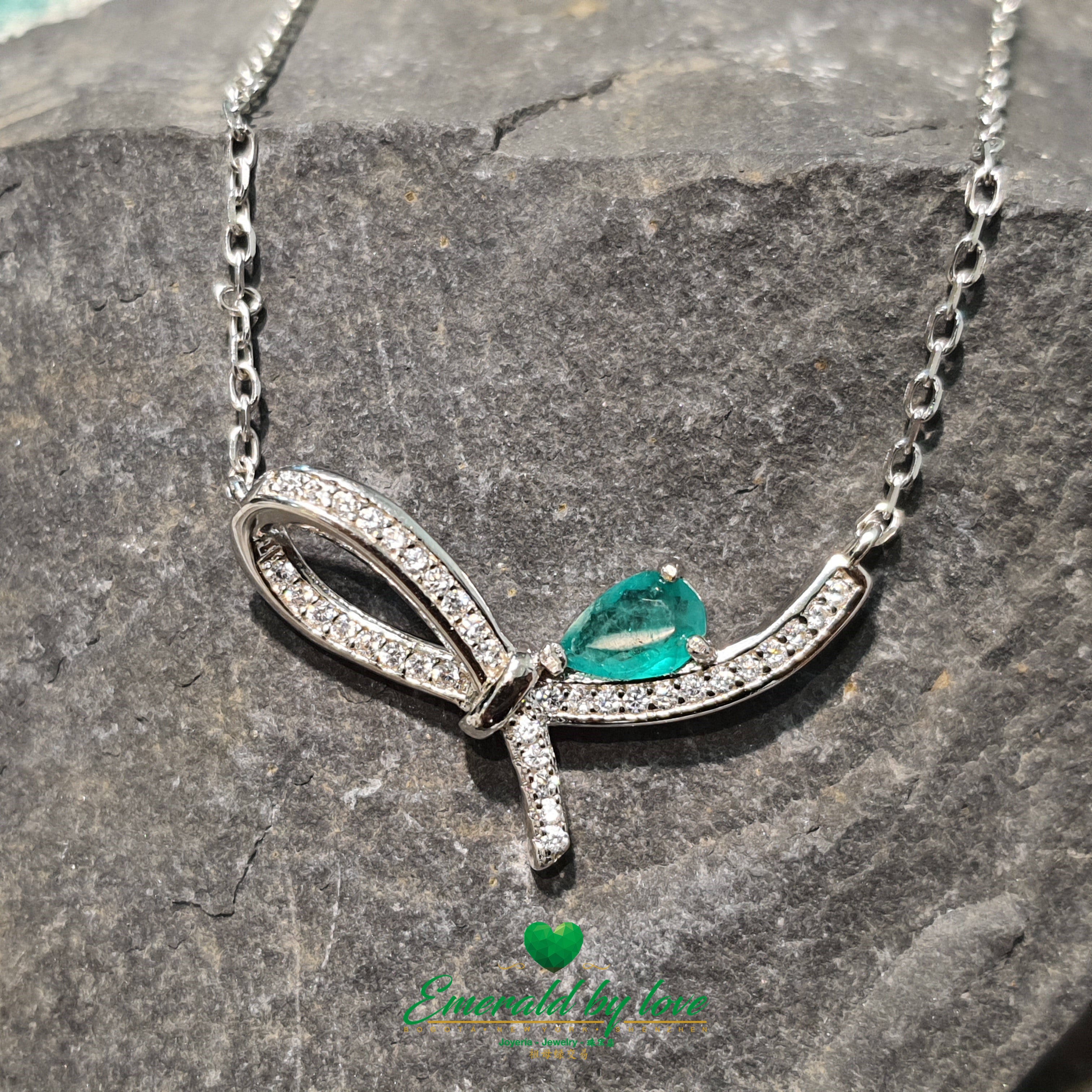 Simple Bow-Shaped Pendant with Teardrop Crystal Emerald