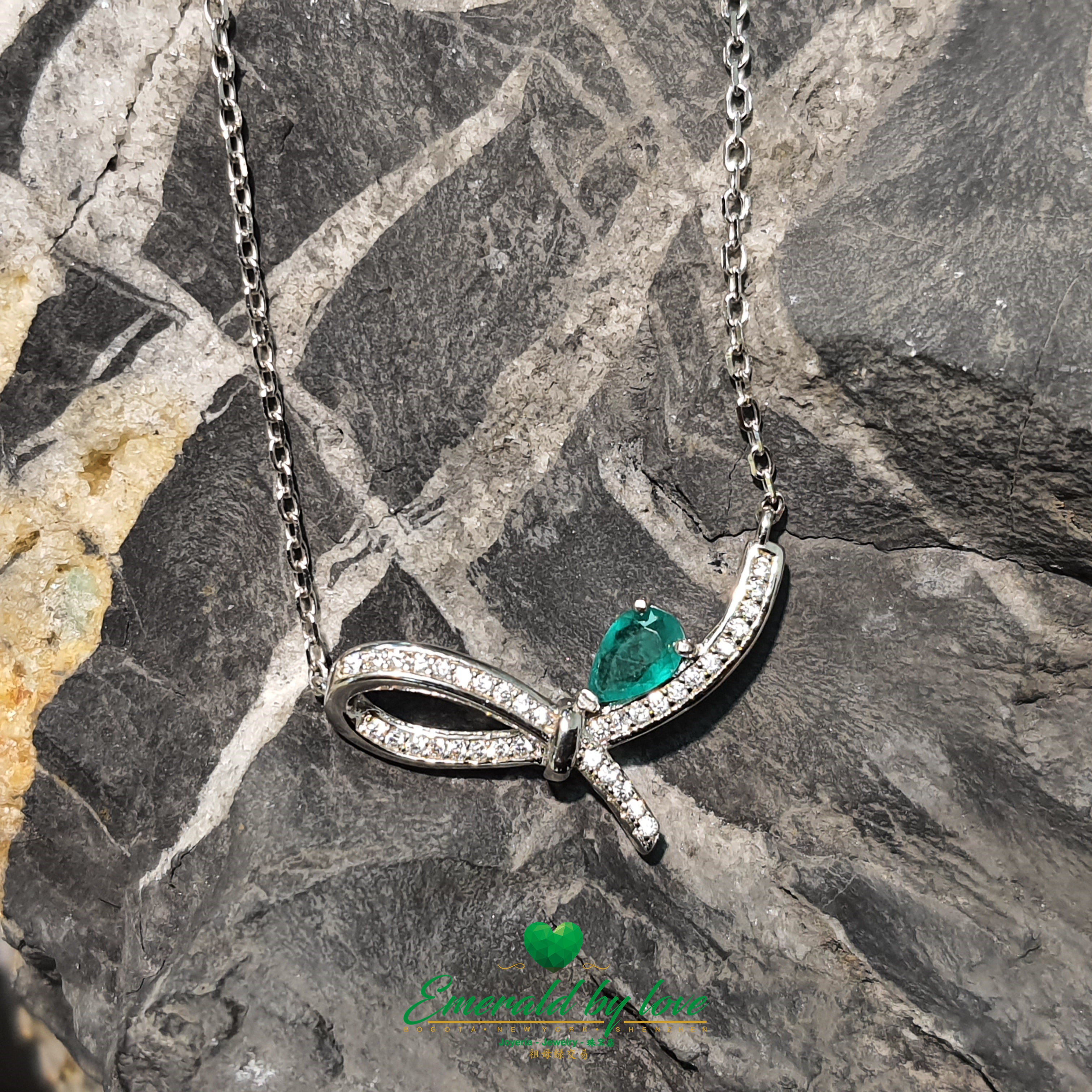 Simple Bow-Shaped Pendant with Teardrop Crystal Emerald