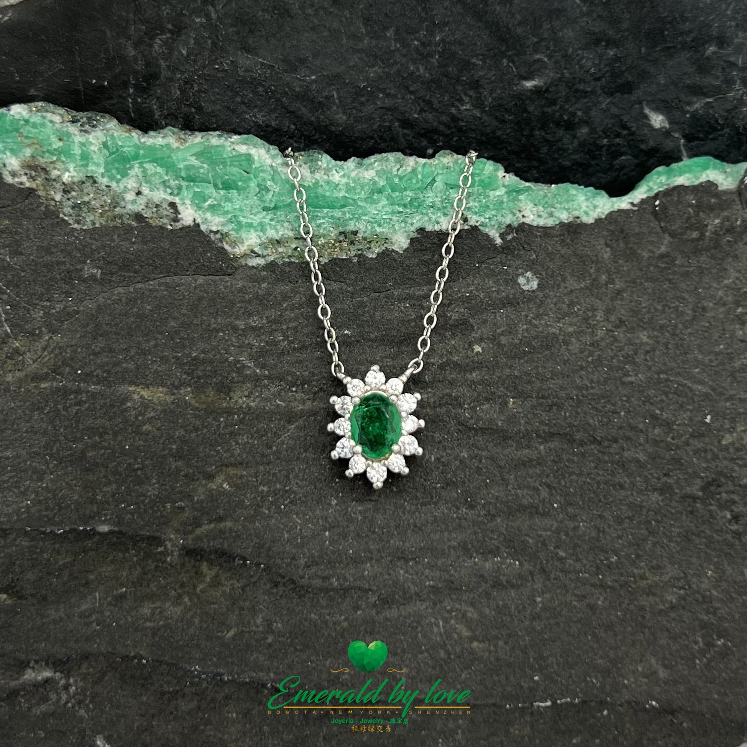 Elongated Flower Pendant with Oval Crystal Emerald