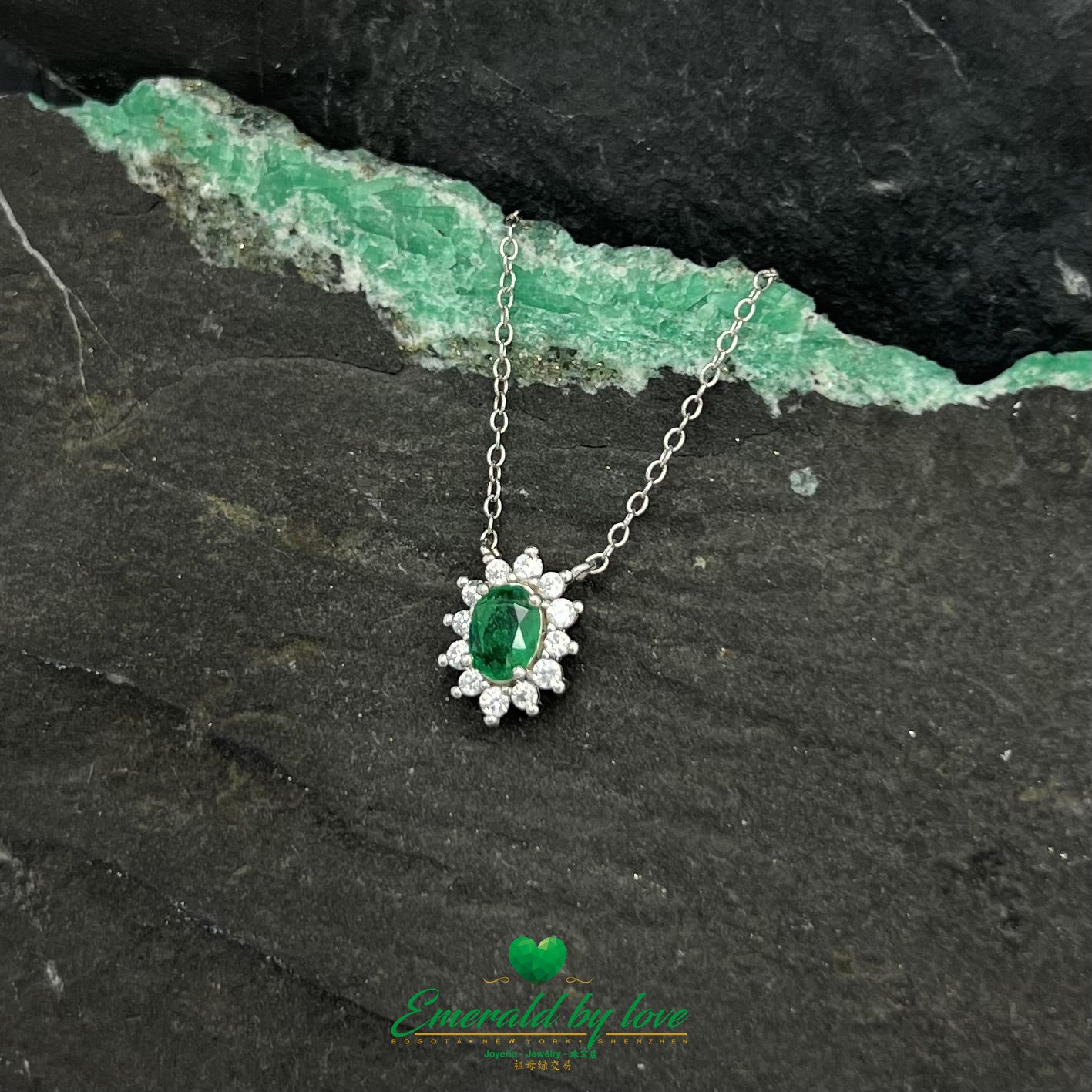 Elongated Flower Pendant with Oval Crystal Emerald