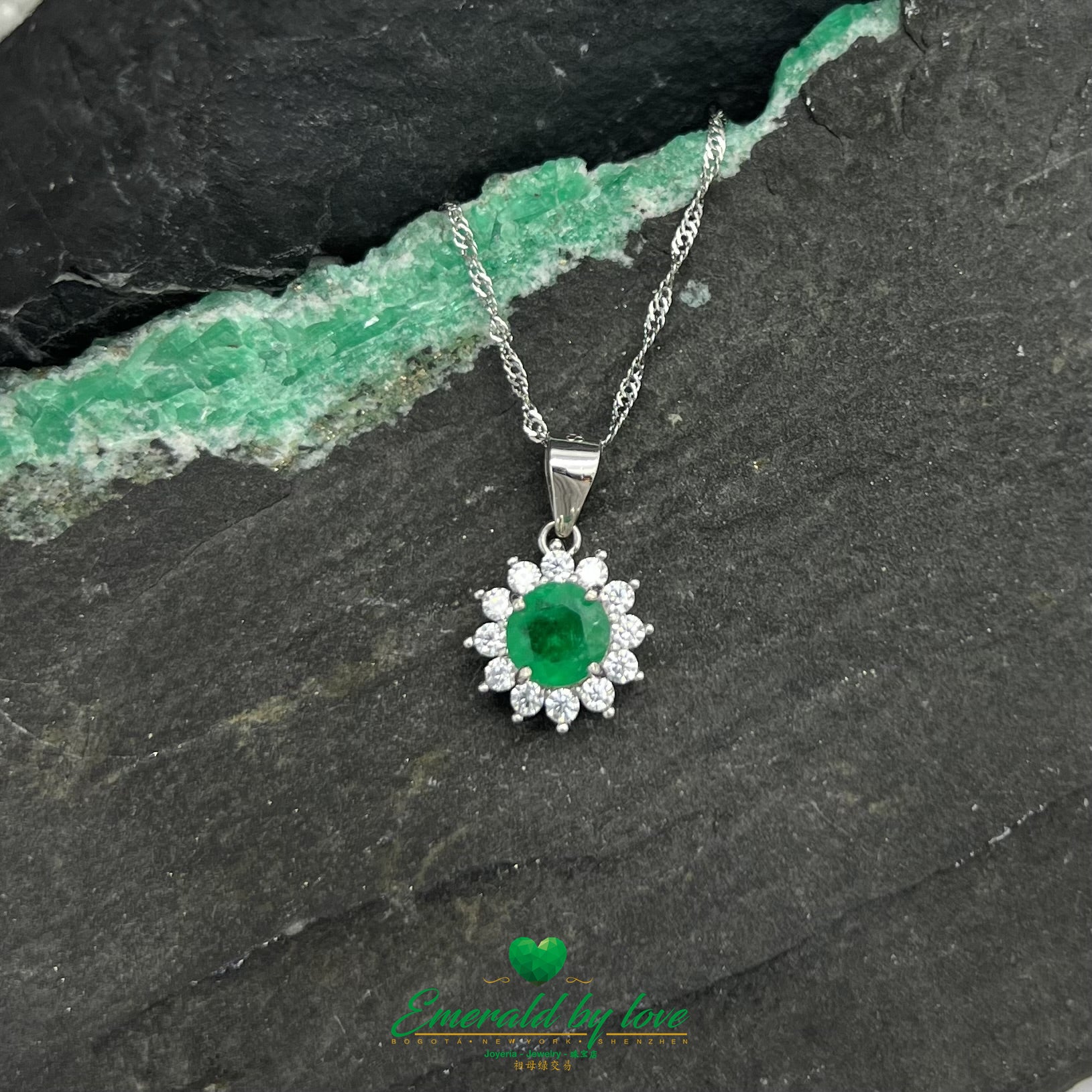 Multi-Petal Flower Pendant with Central Round Emerald and Surrounding Cubic Zirconia