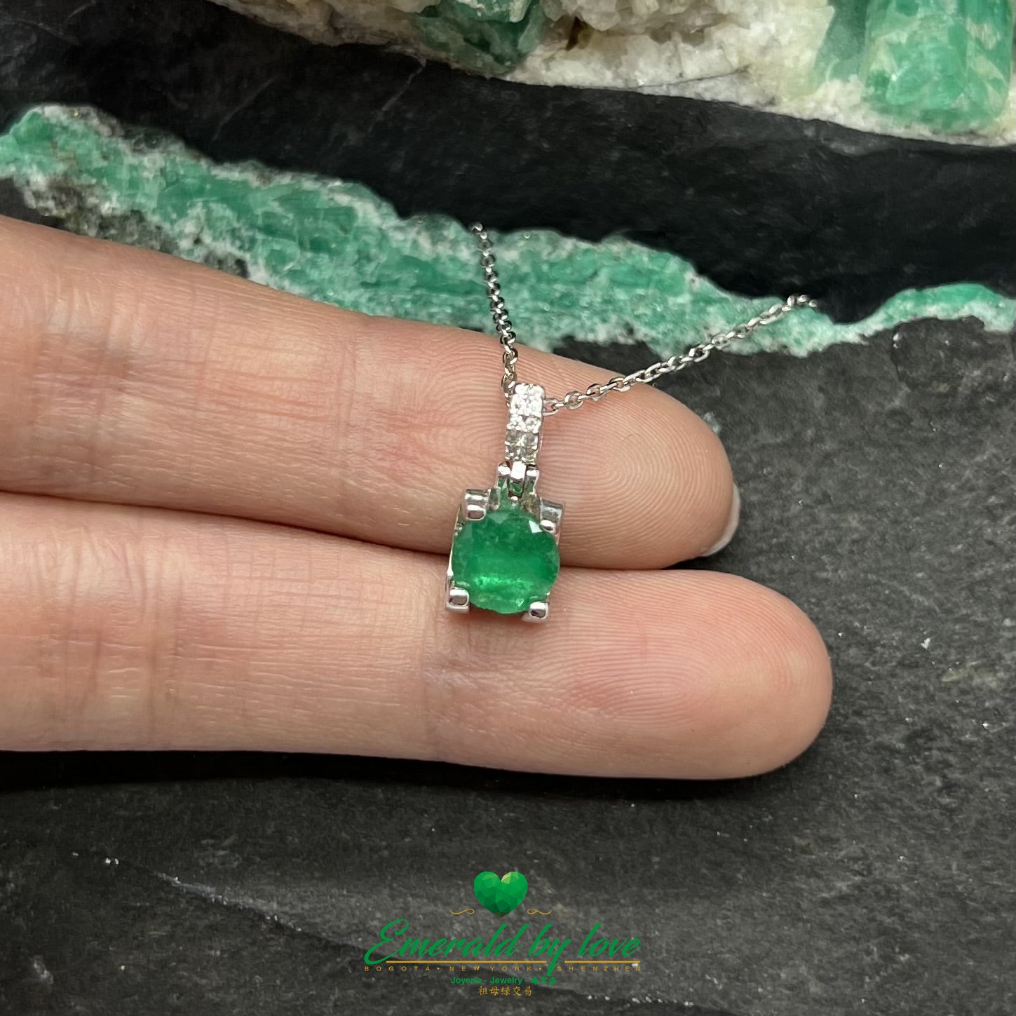 Elegant Round Emerald Pendant with Four-Prong Setting