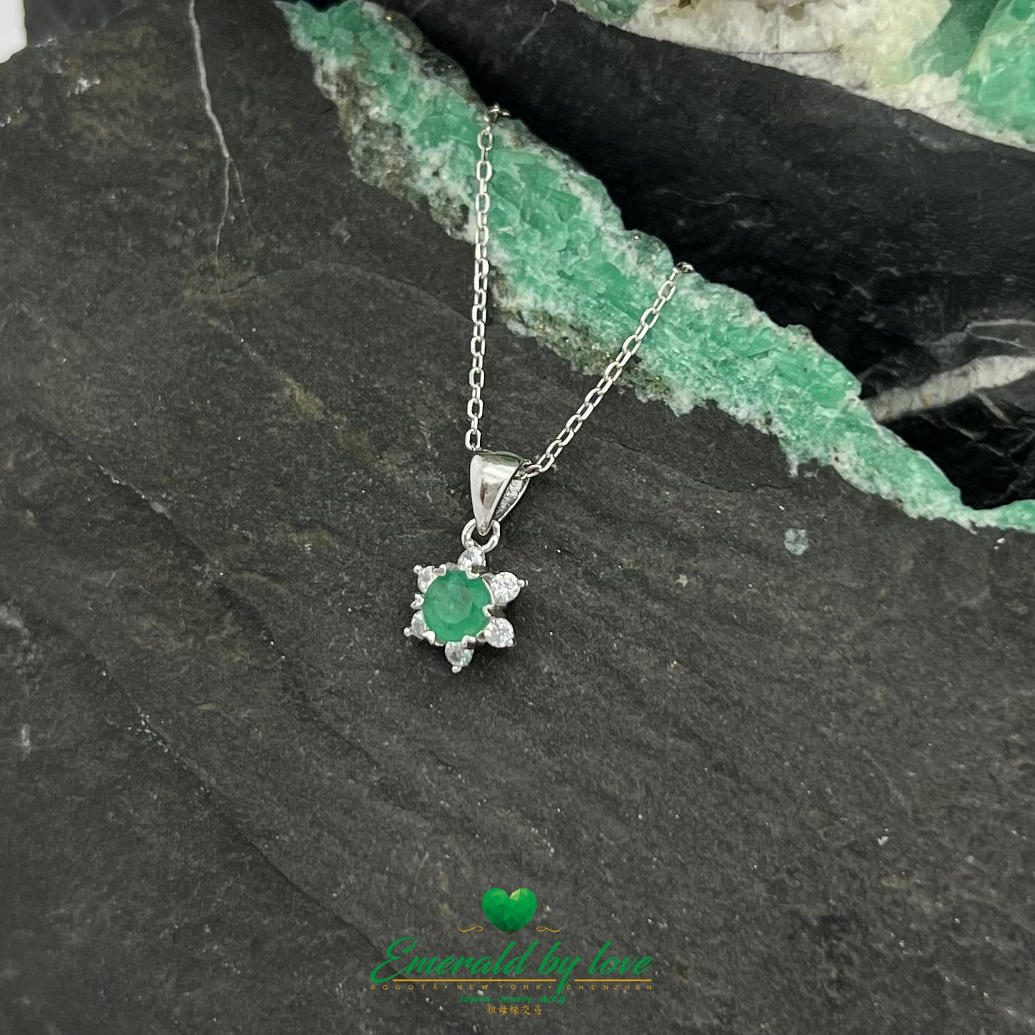 Small Six-Petal Flower Pendant with Round Central Emerald