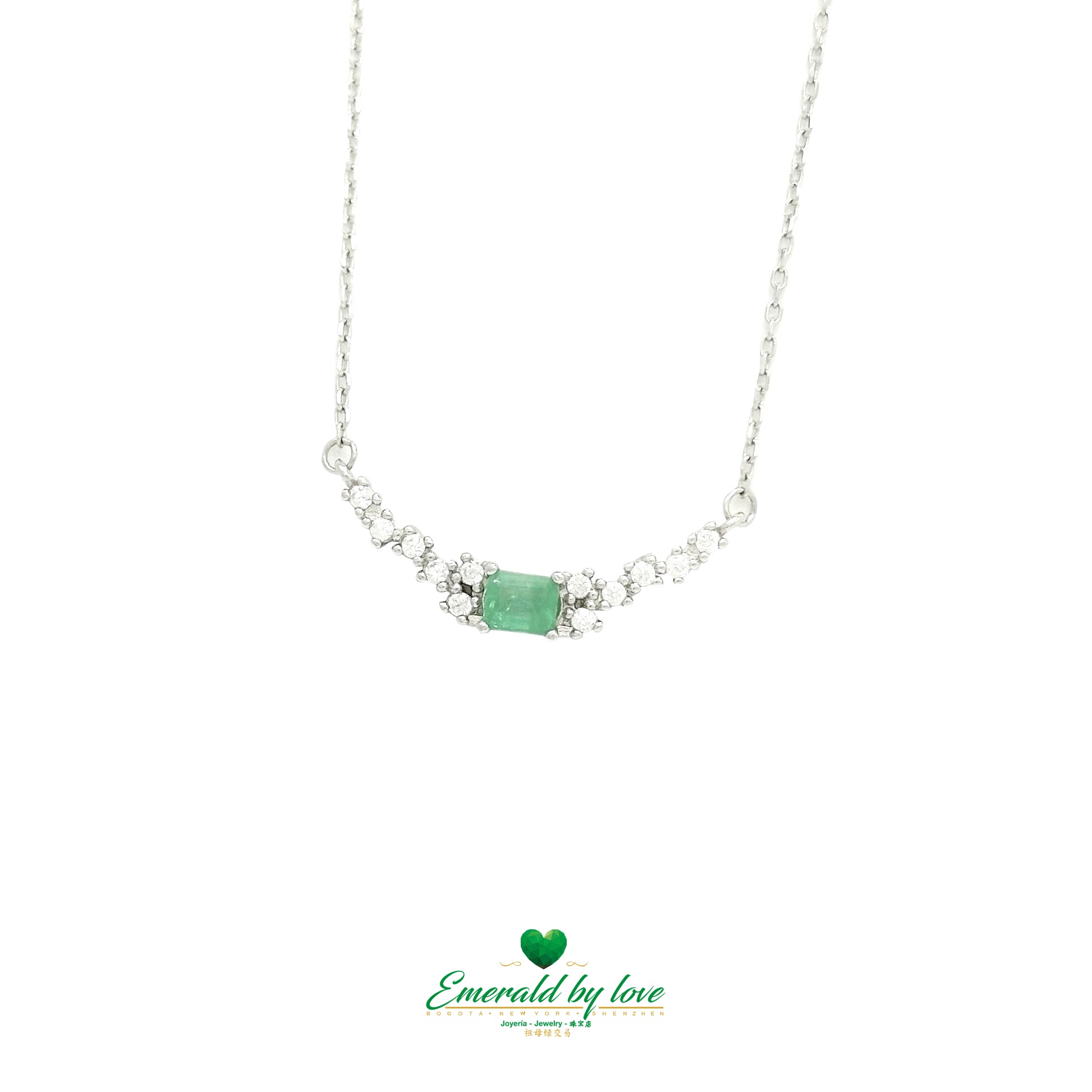 Curved Sterling Silver Pendant with Baguette-Cut Emerald and Side Cubic Zirconia