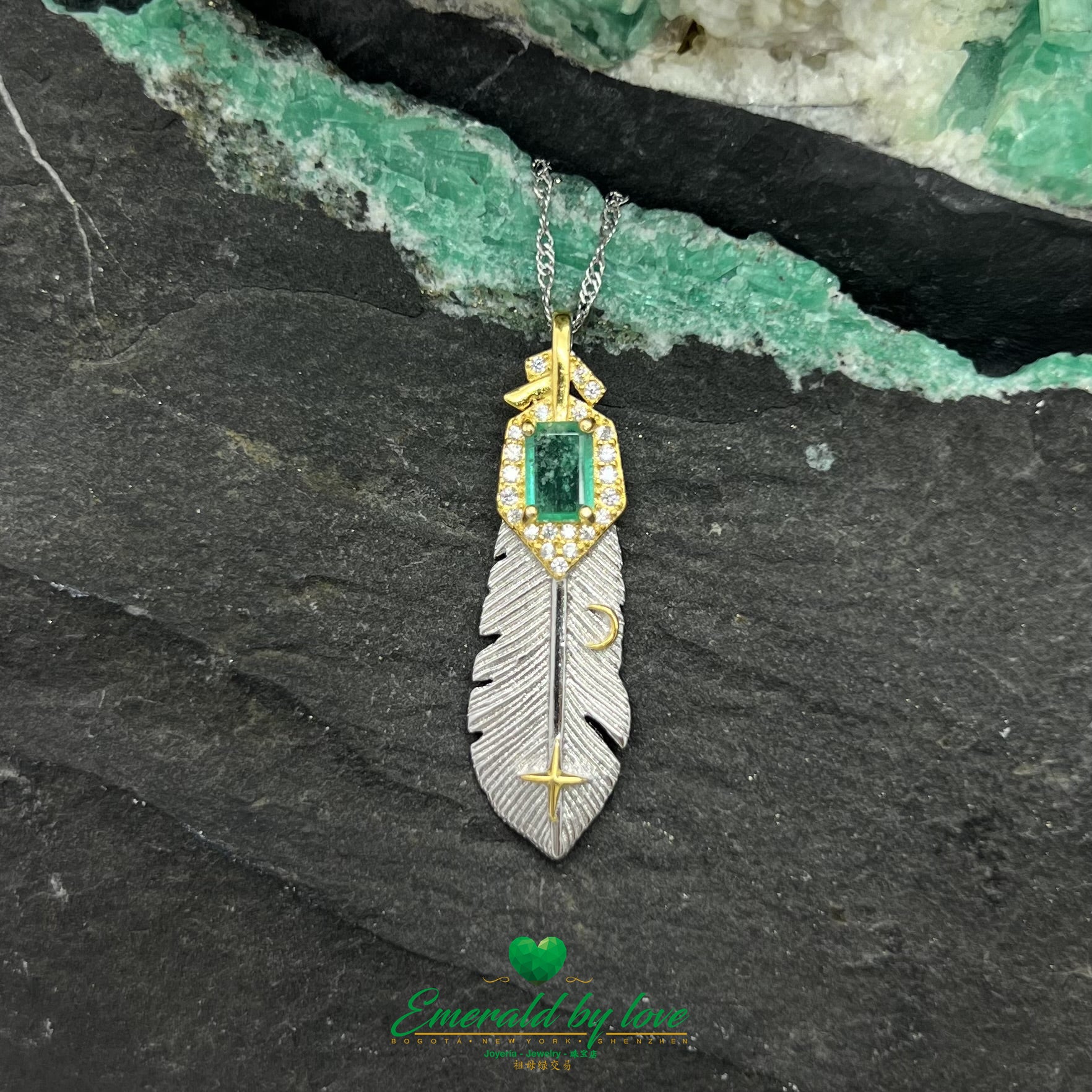 Gold-Plated Feather Pendant with Central Baguette Crystal Emerald