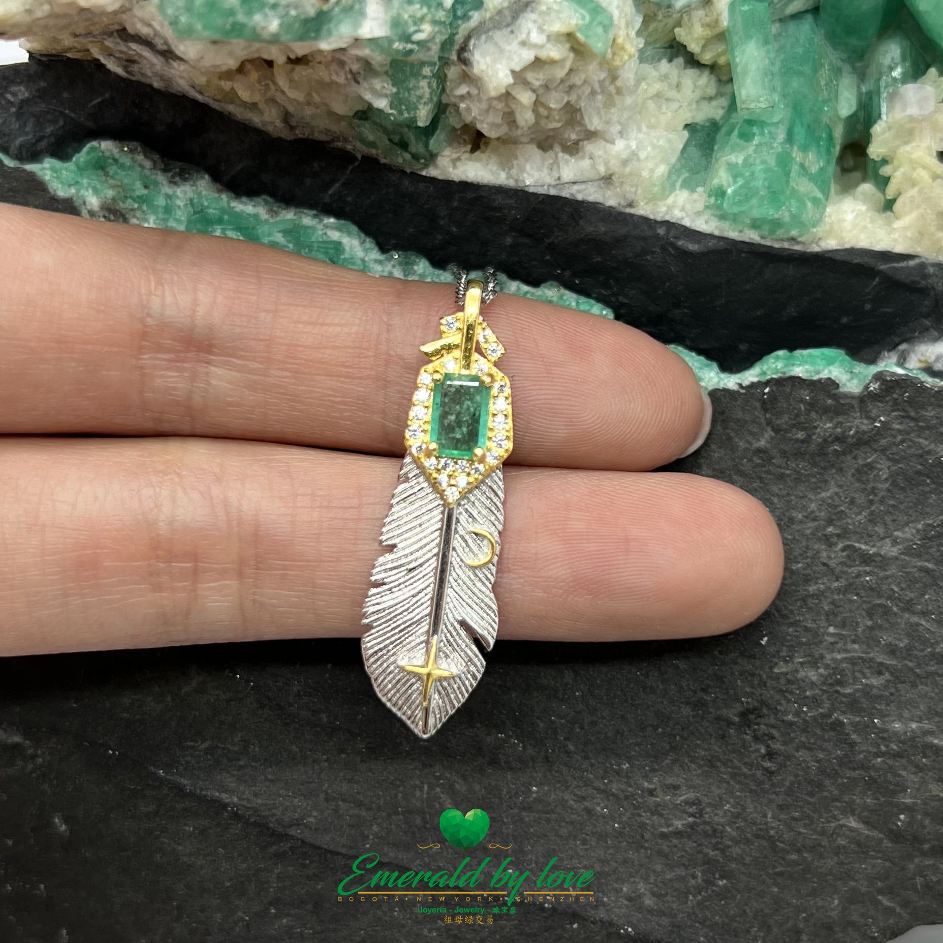 Gold-Plated Feather Pendant with Central Baguette Crystal Emerald