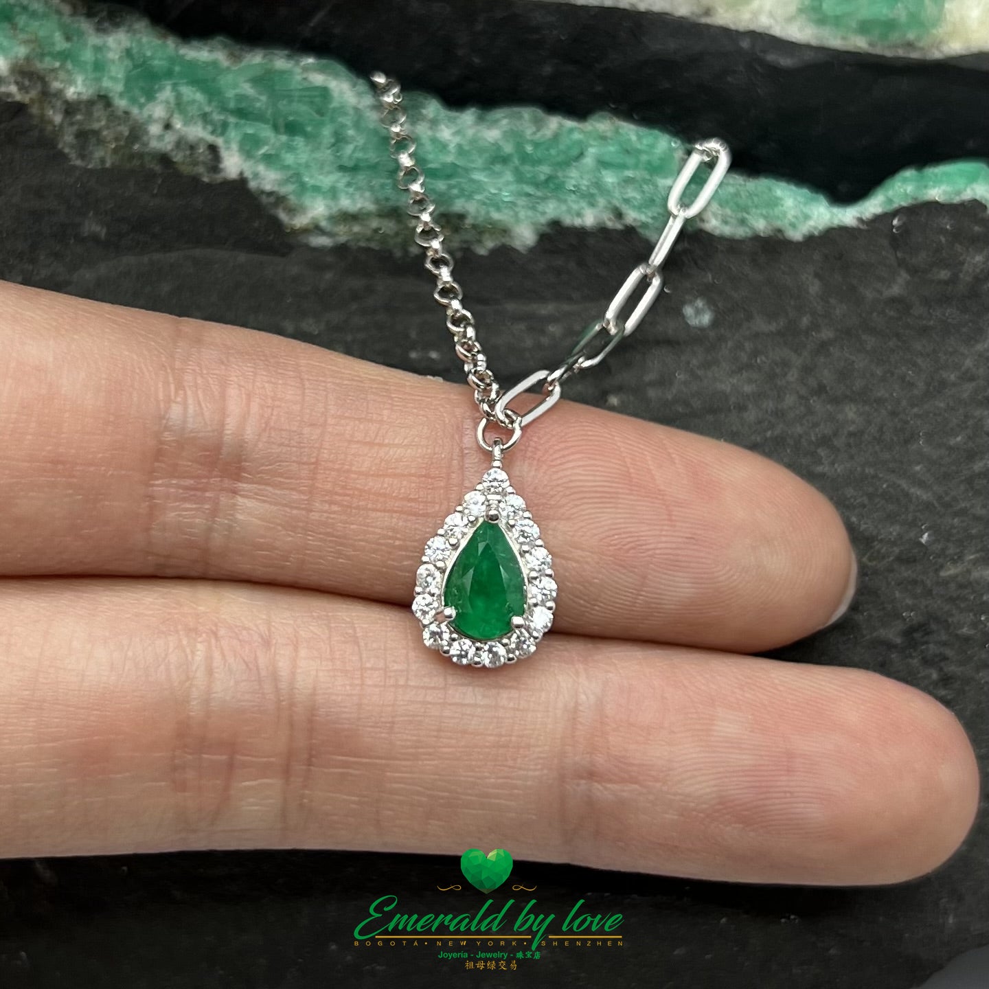Pear-Shaped Marquise Emerald Pendant with Surrounding Cubic Zirconia and Double Chain