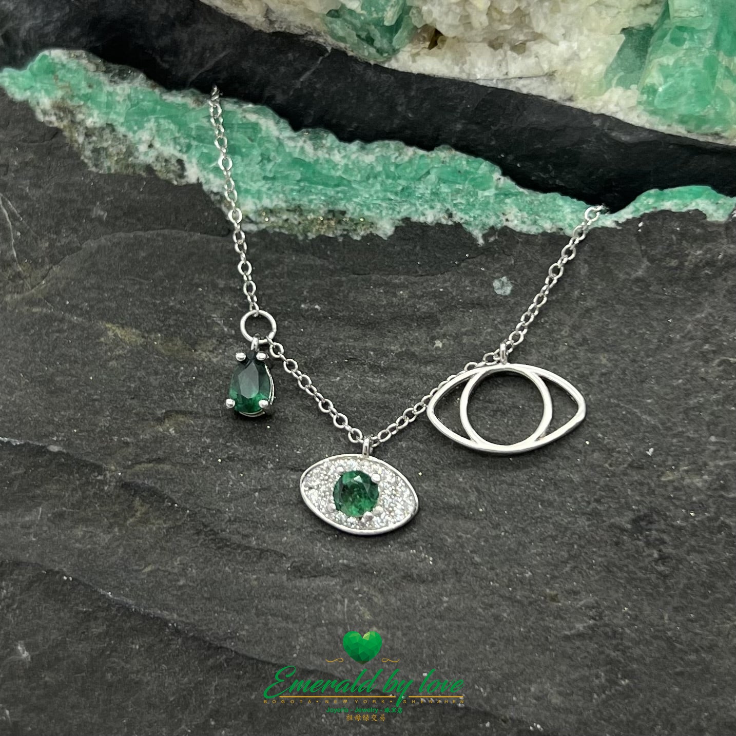 Silver Necklace with Three Eye Pendants, Two Featuring Round Emeralds