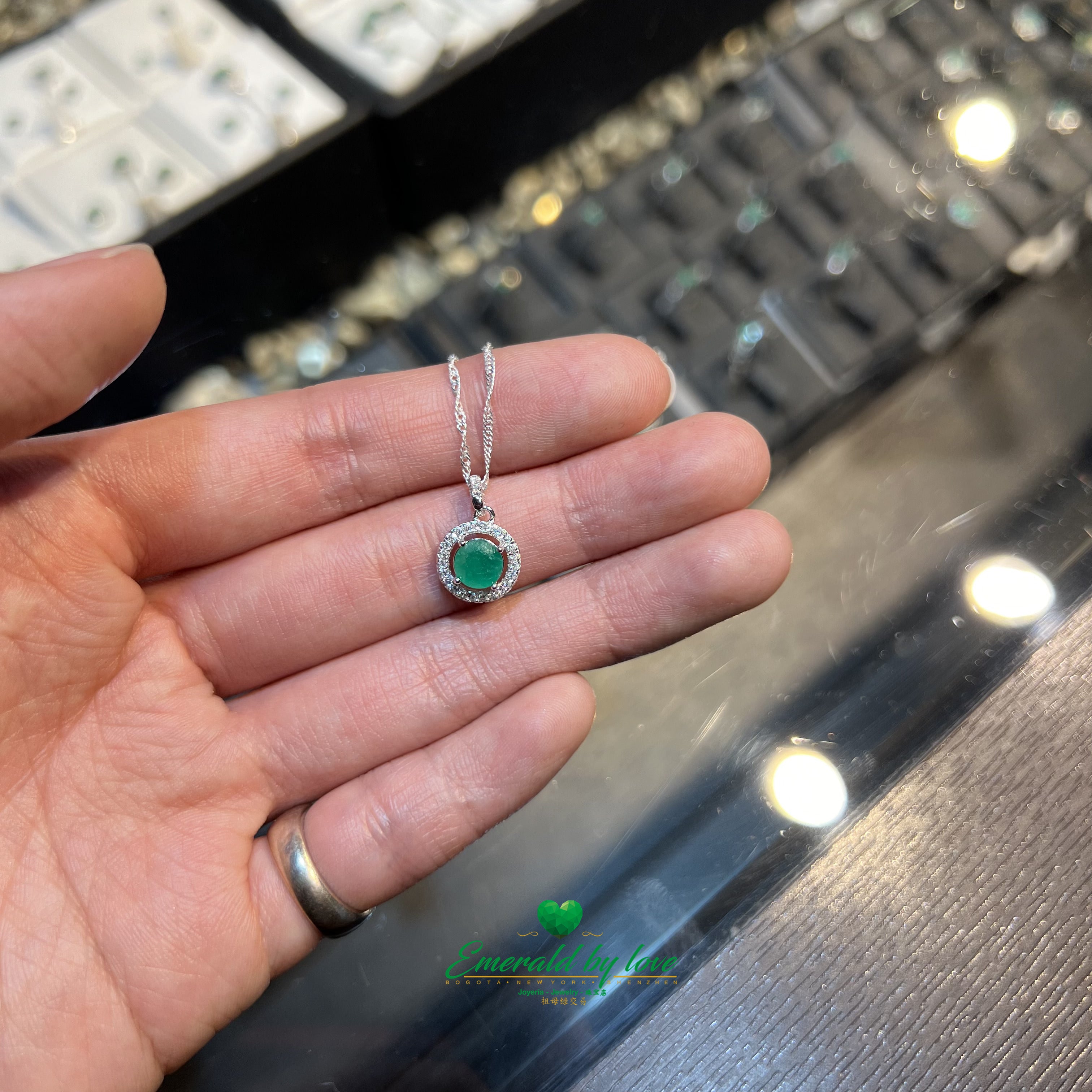 Round Marquis Pendant with Central Emerald and Zircon Accents