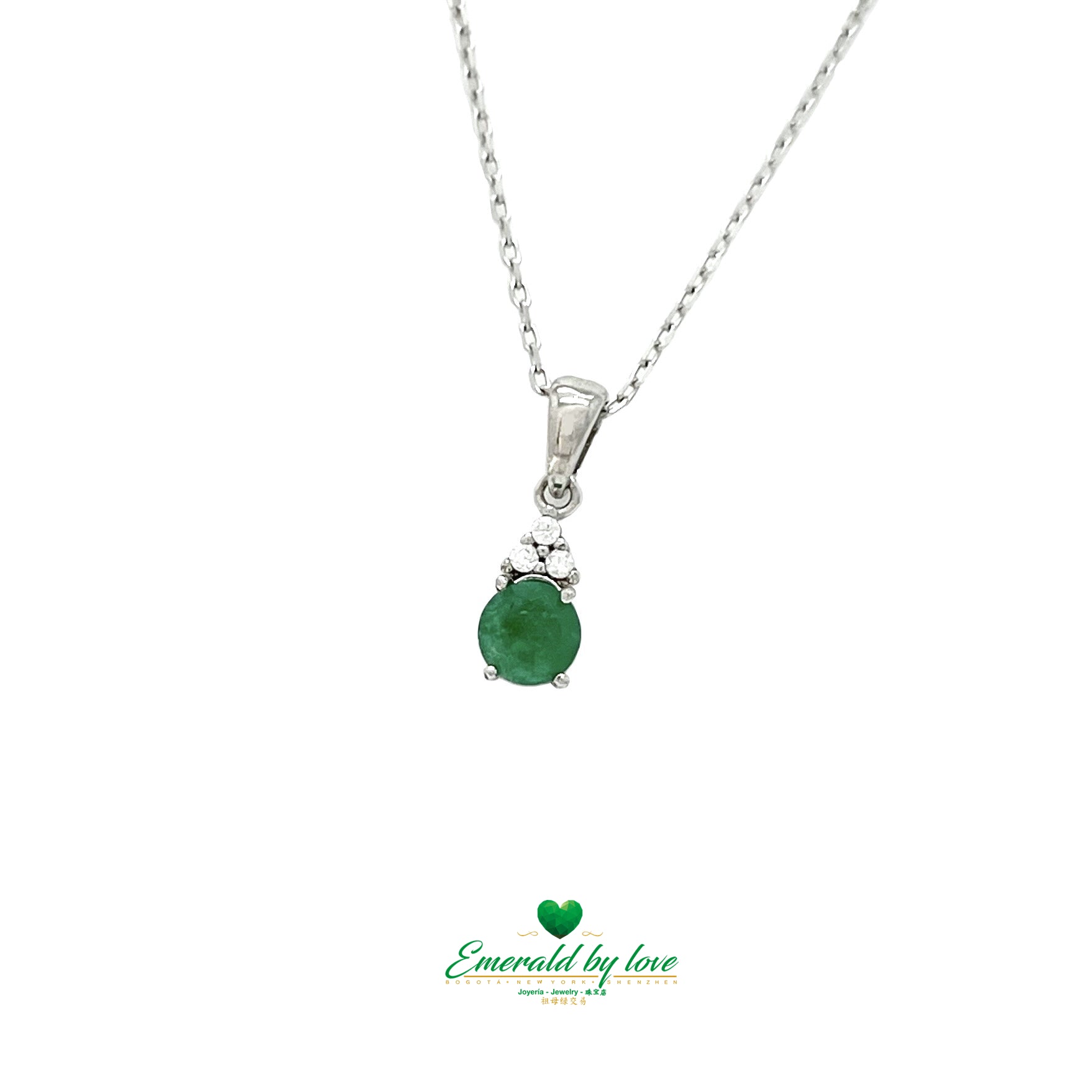 Elegant Trio Accent Round Emerald Pendant with Decorative Zircons