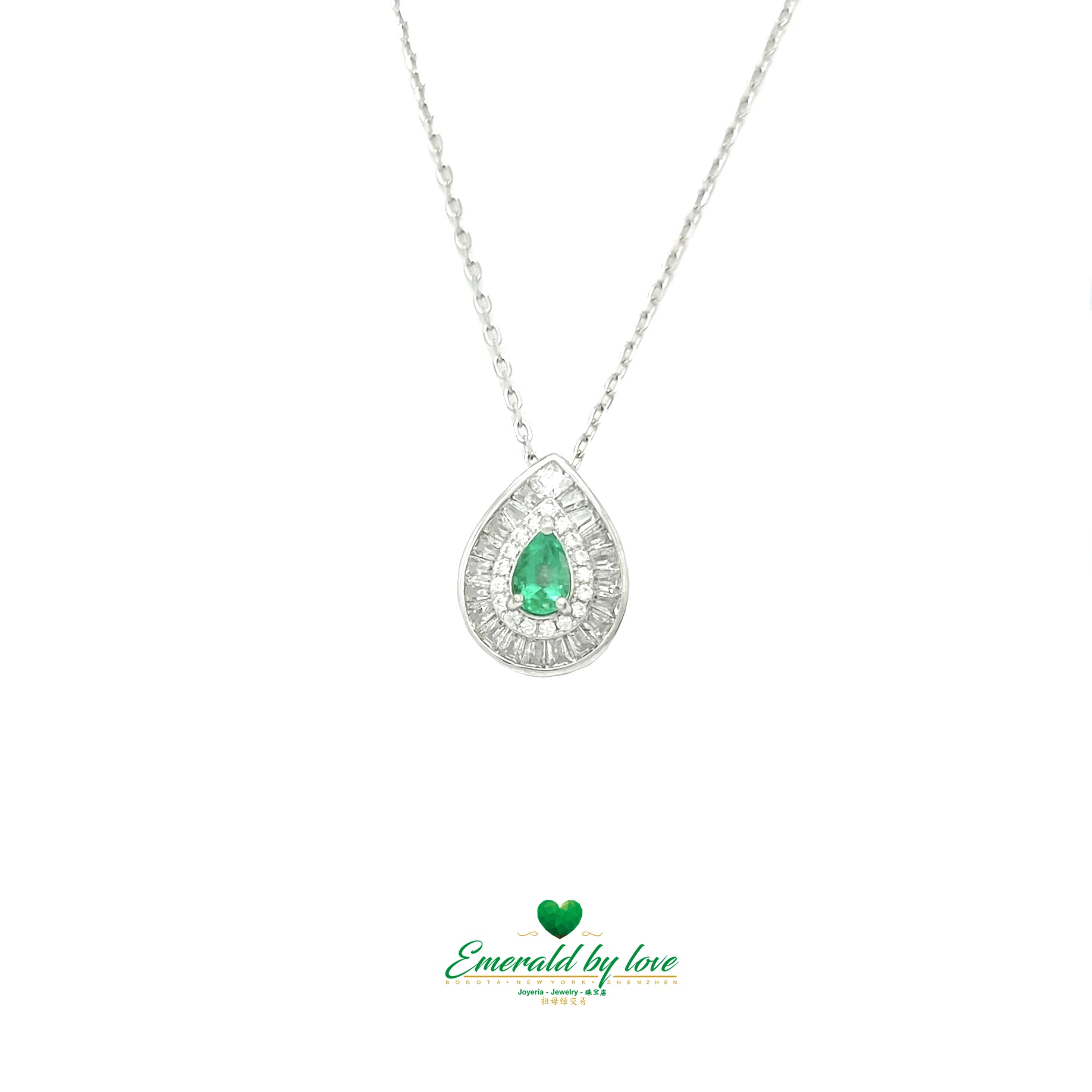 Pendant with Pear-Shaped Colombian Emerald Surrounded by Round and Baguette White Zircons