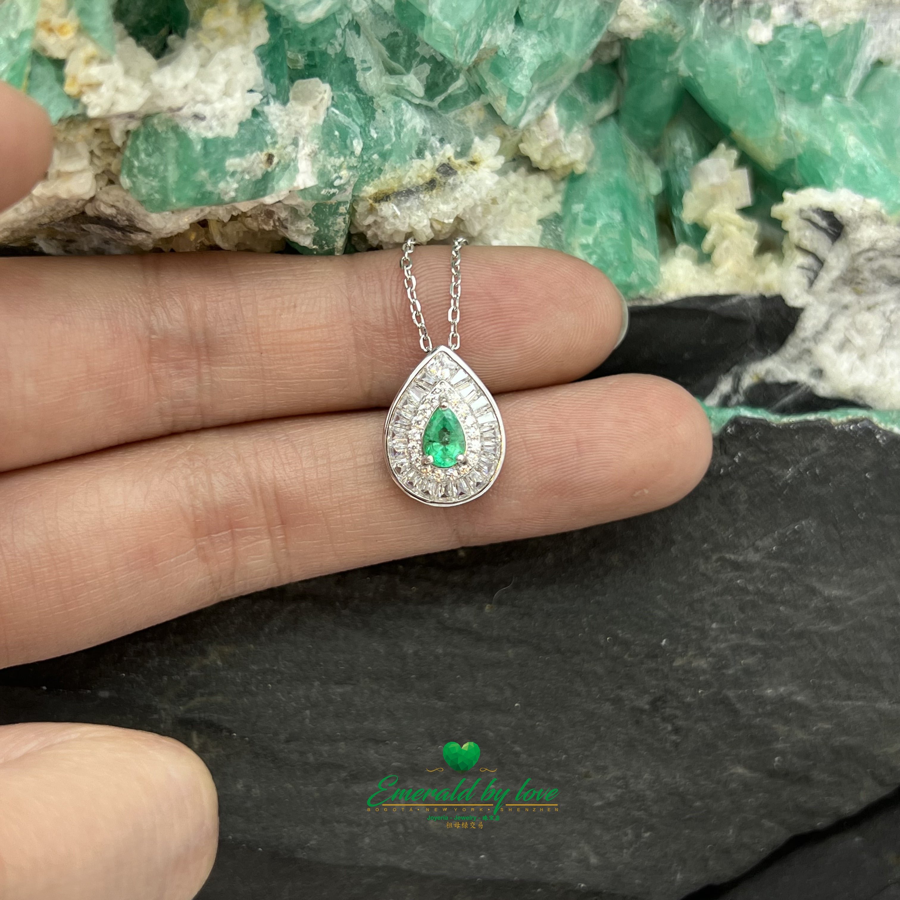 Pendant with Pear-Shaped Colombian Emerald Surrounded by Round and Baguette White Zircons