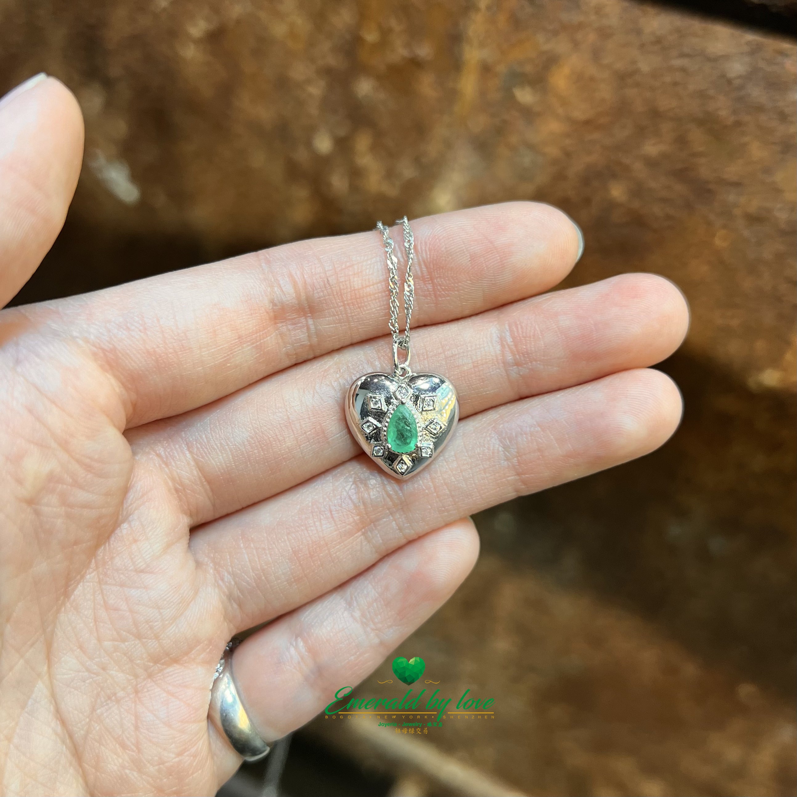 Sterling Silver Heart Pendant with Teardrop Colombian Emerald and Intricate Arabesque Details