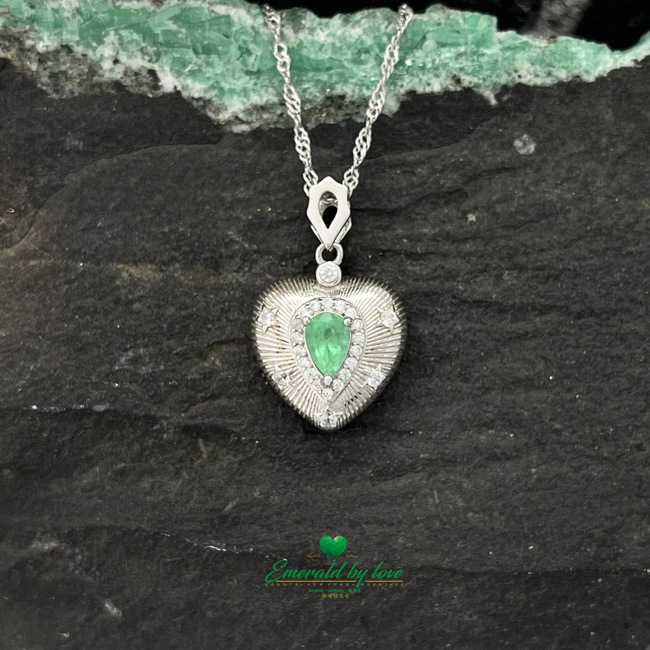 Sterling Silver Heart Pendant with Inverted Teardrop Colombian Emerald, Zircon Halo, and Engraved Line Details