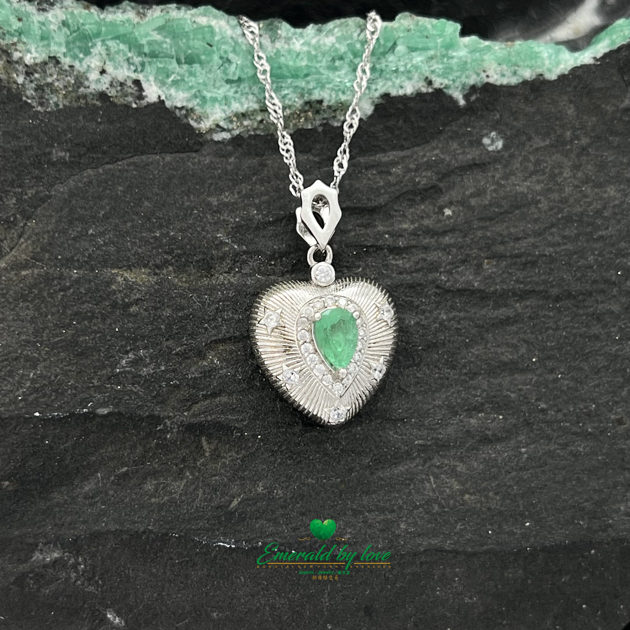 Sterling Silver Heart Pendant with Inverted Teardrop Colombian Emerald, Zircon Halo, and Engraved Line Details