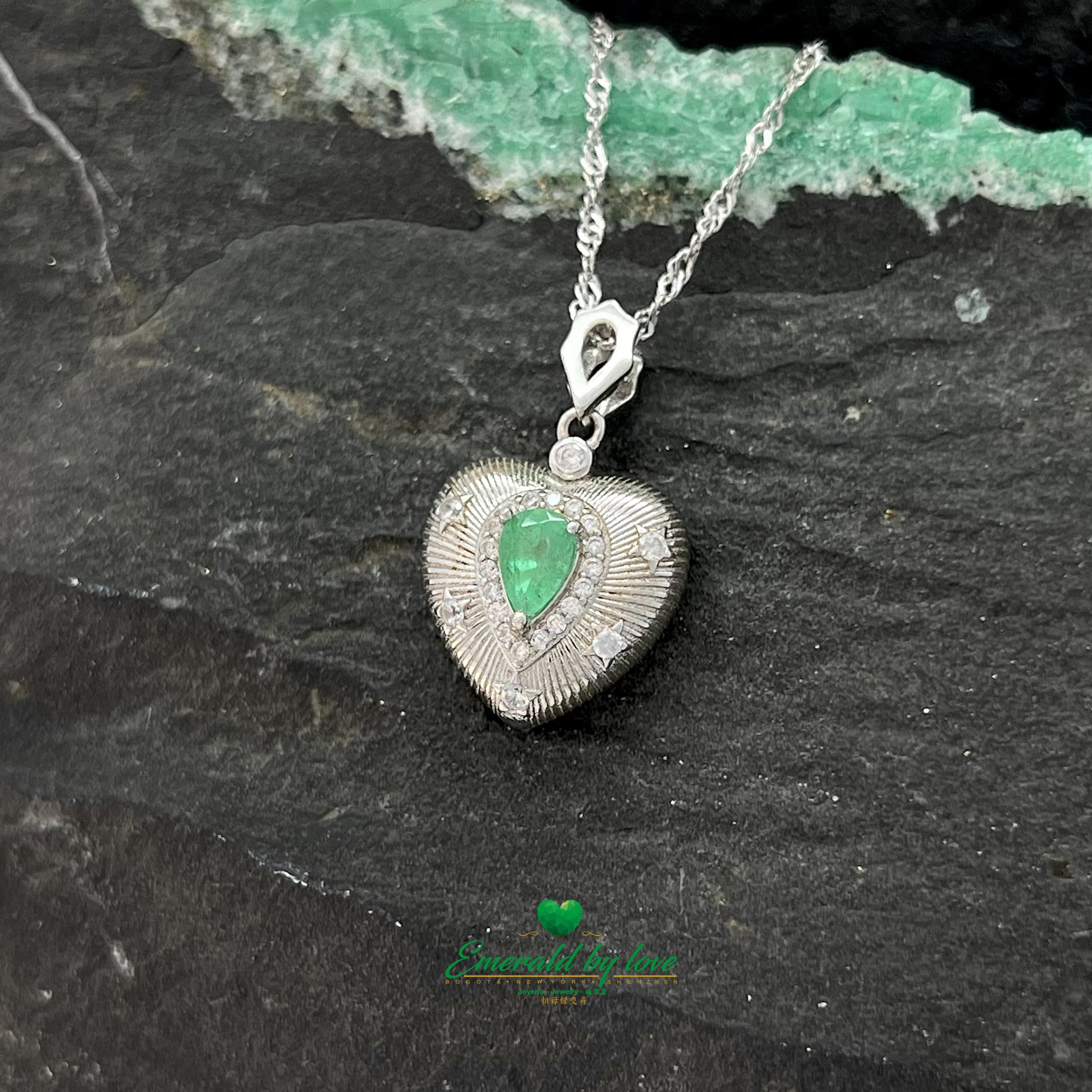 Sterling Silver Heart Pendant with Inverted Teardrop Colombian Emerald, Zircon Halo, and Engraved Line Details