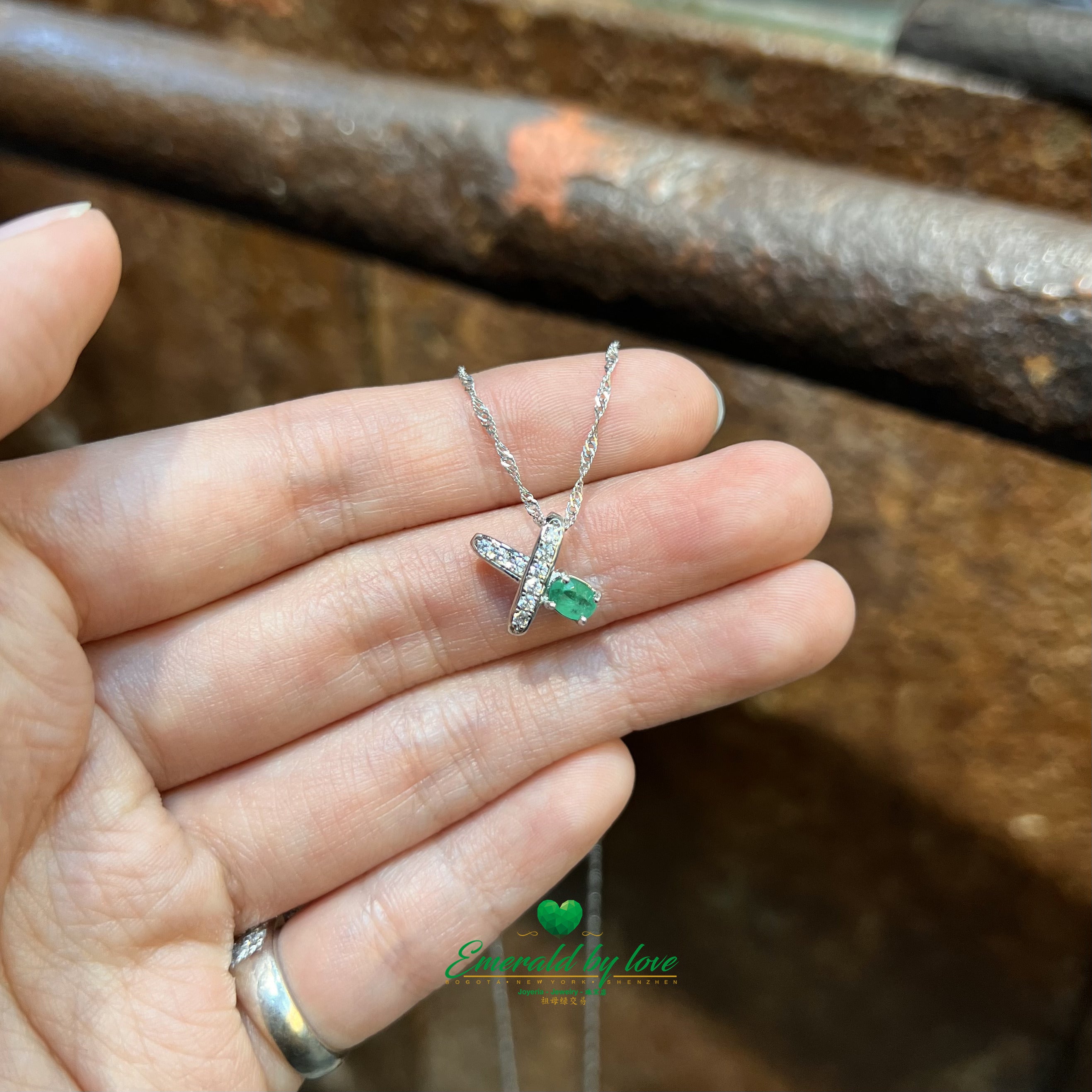 X-Shaped Pendant with Oval Colombian Emerald on One Tip