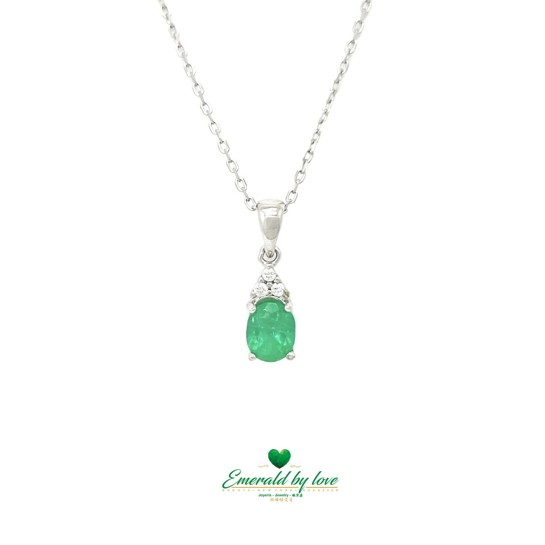 Sterling Silver Oval Crystal Emerald Pendant with Three Zircons