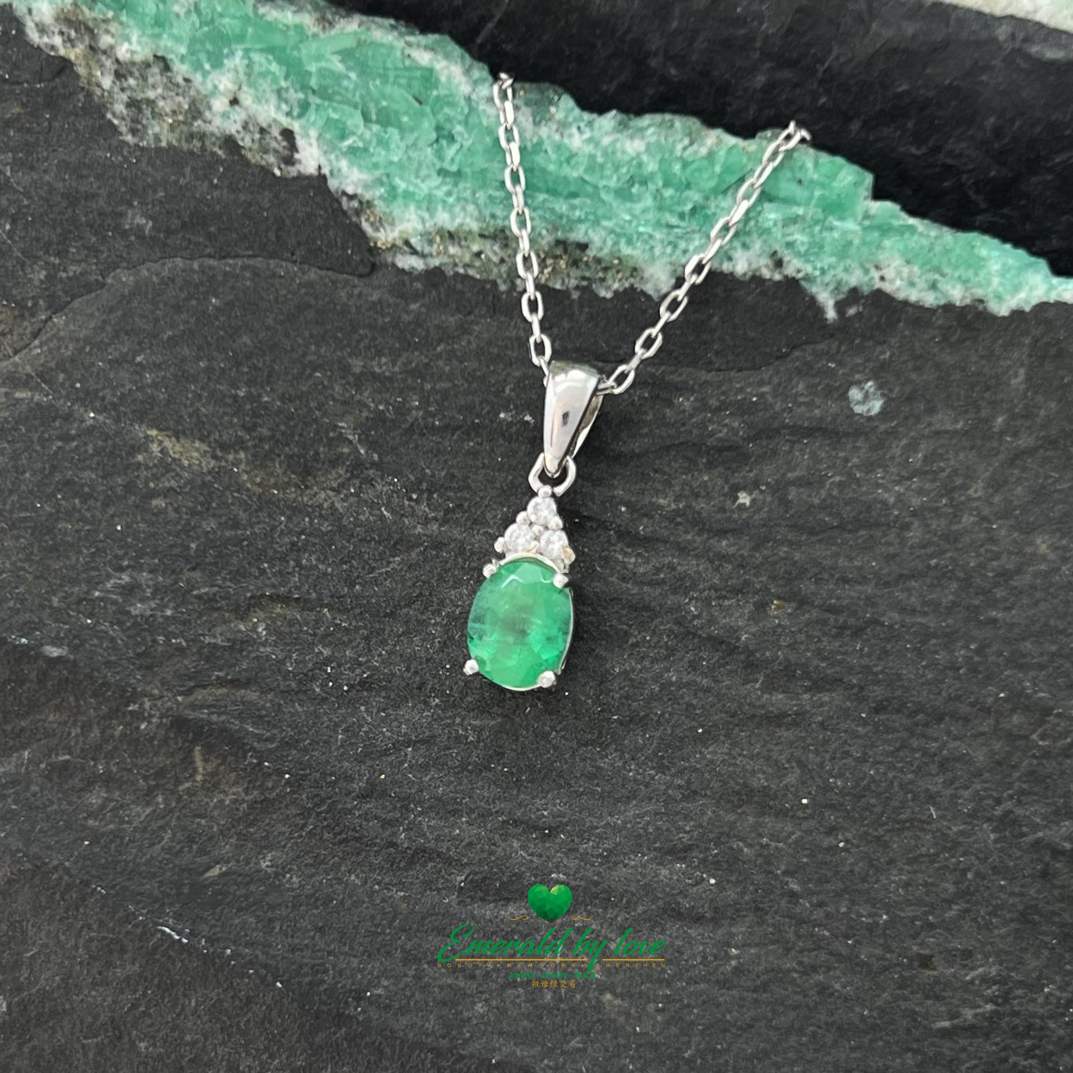 Sterling Silver Oval Crystal Emerald Pendant with Three Zircons