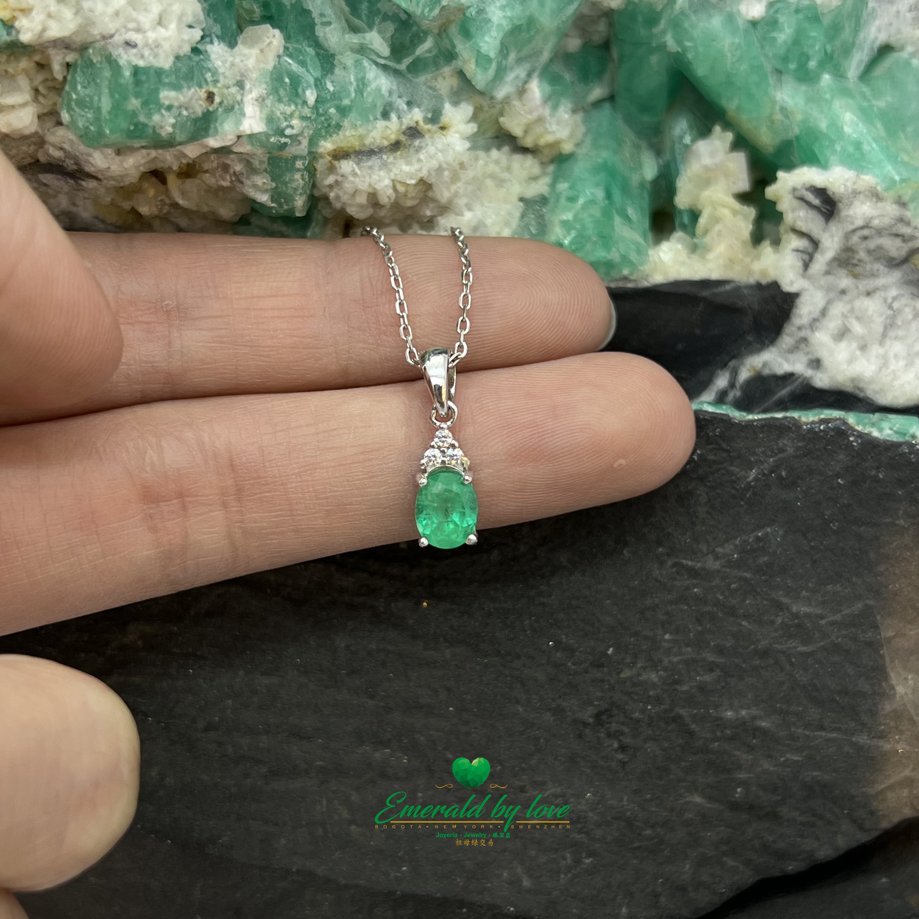 Sterling Silver Oval Crystal Emerald Pendant with Three Zircons