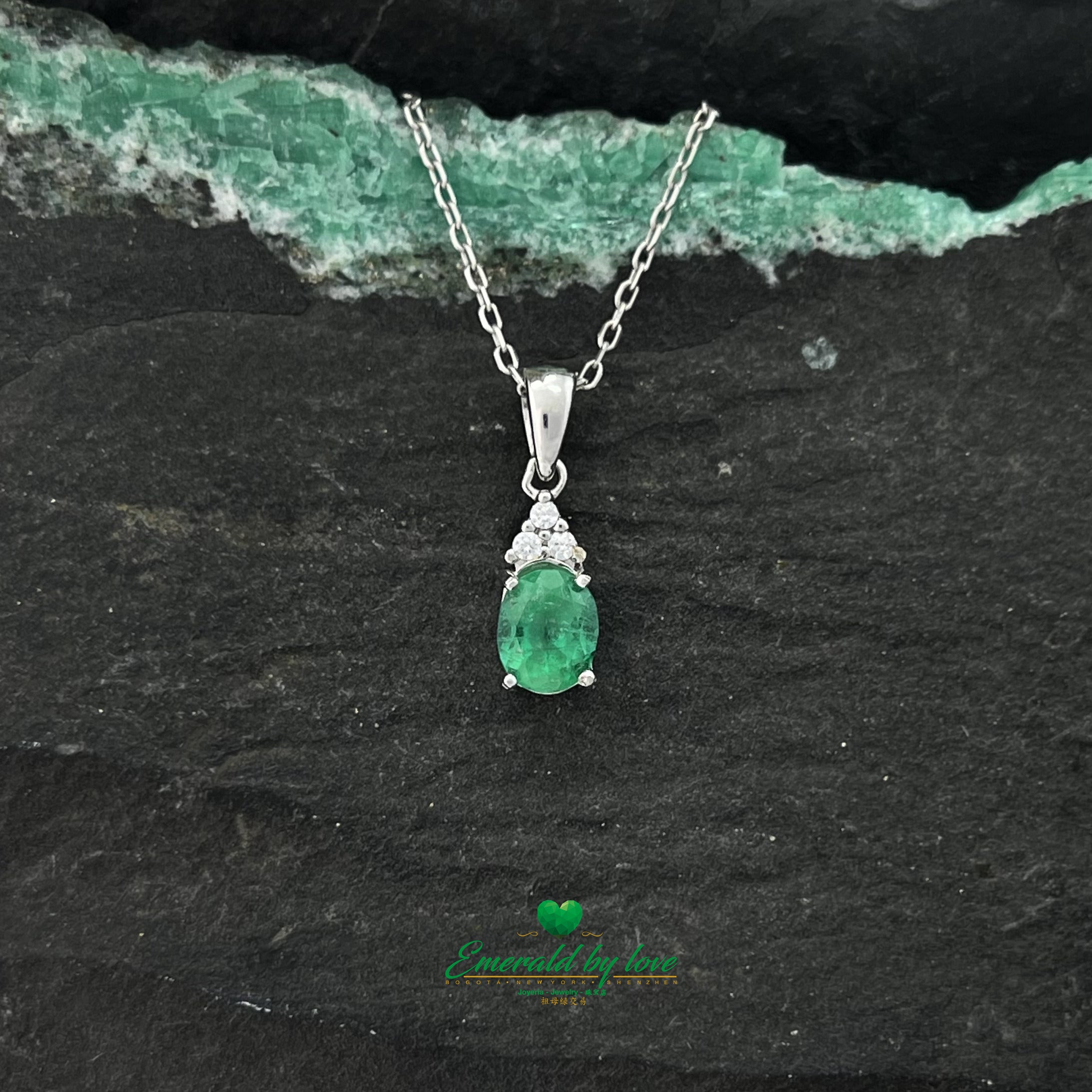 Sterling Silver Oval Crystal Emerald Pendant with Three Zircons