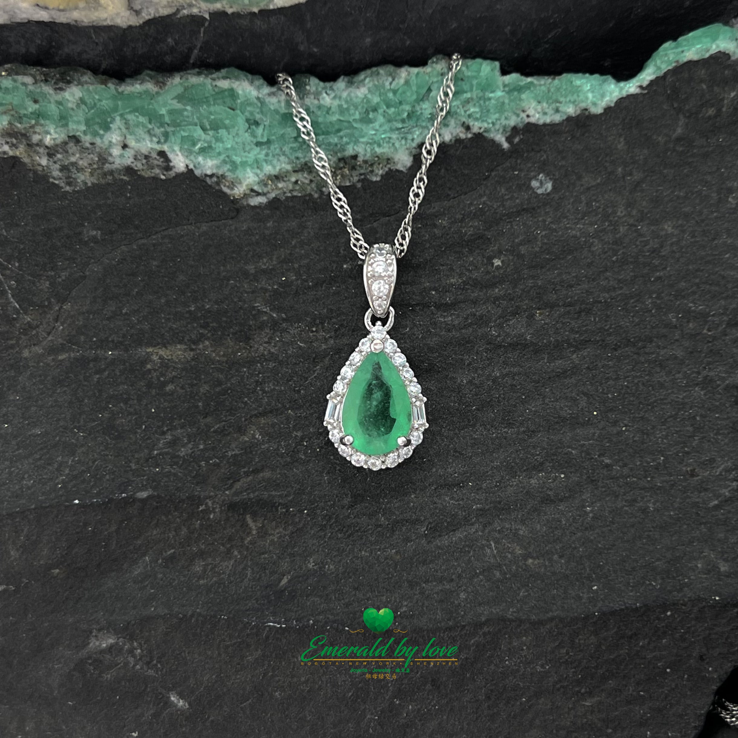 Beautiful Pendant with Pear-Shaped Emerald Surrounded by White Zircons