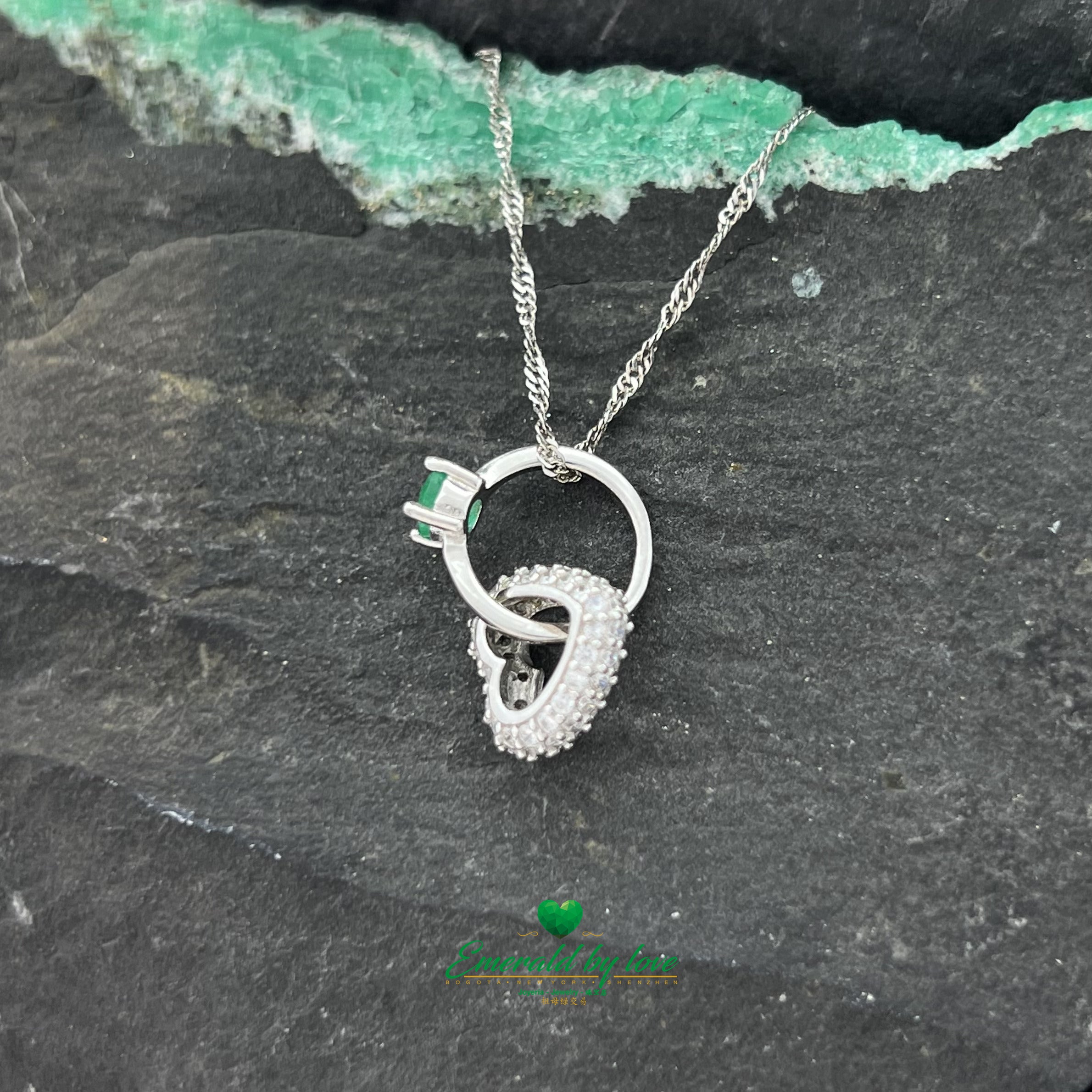 Double Pendant Necklace with Zircon Heart and Intertwined Ring with Round Emerald