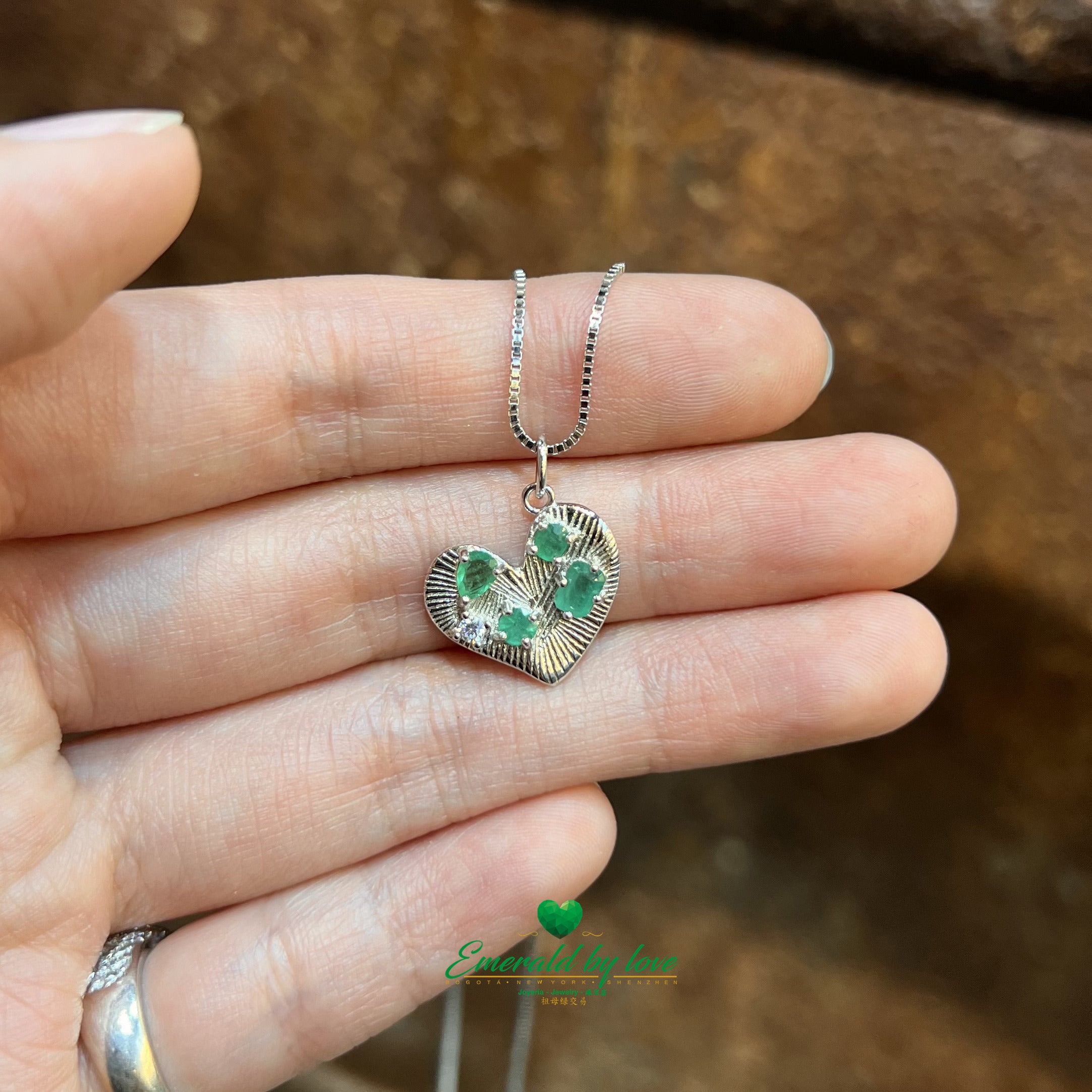 Silver Heart-Shaped Pendant with Mixed Emeralds and Zircon