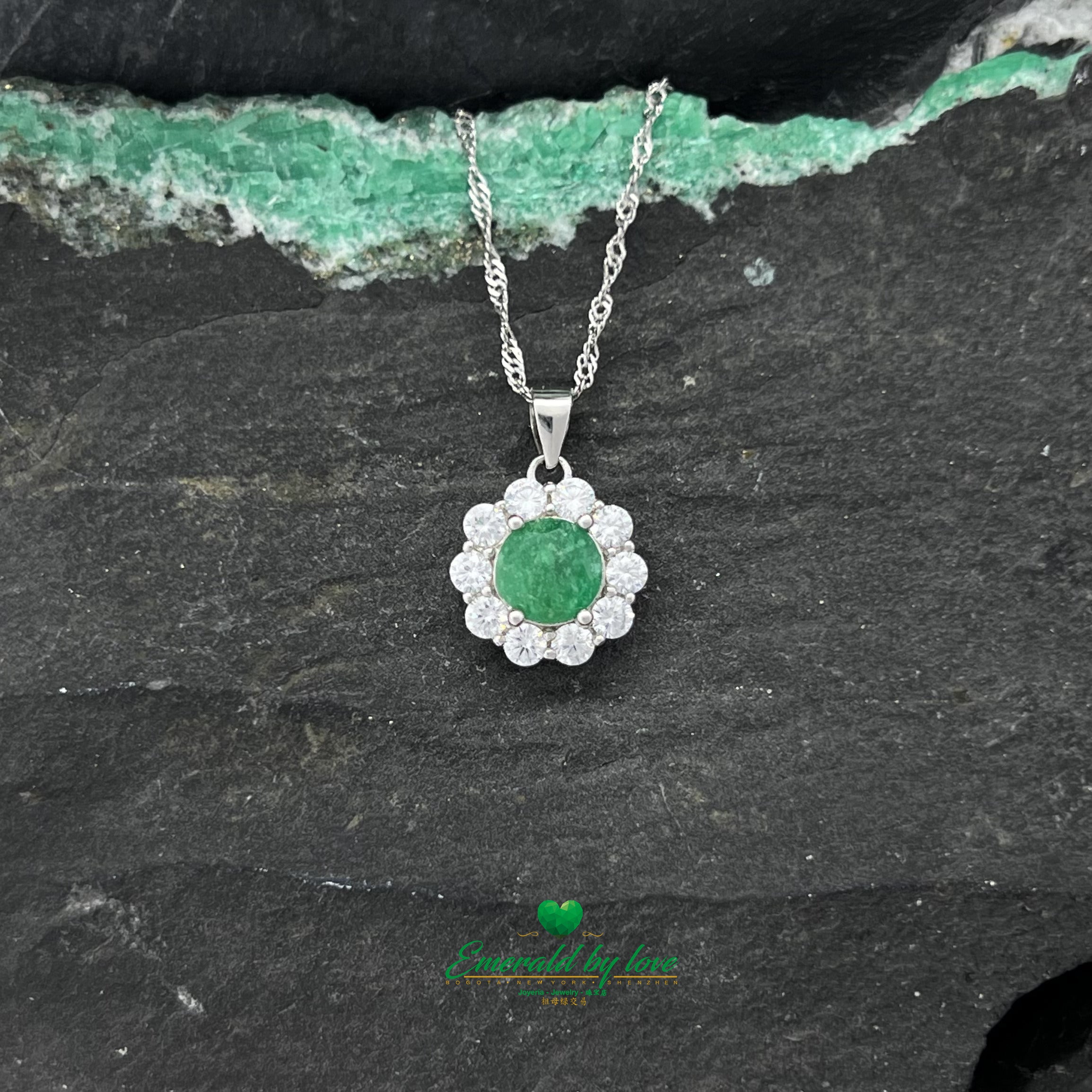 Silver Flower Pendant with Central Round Emerald and White Zircon Petals