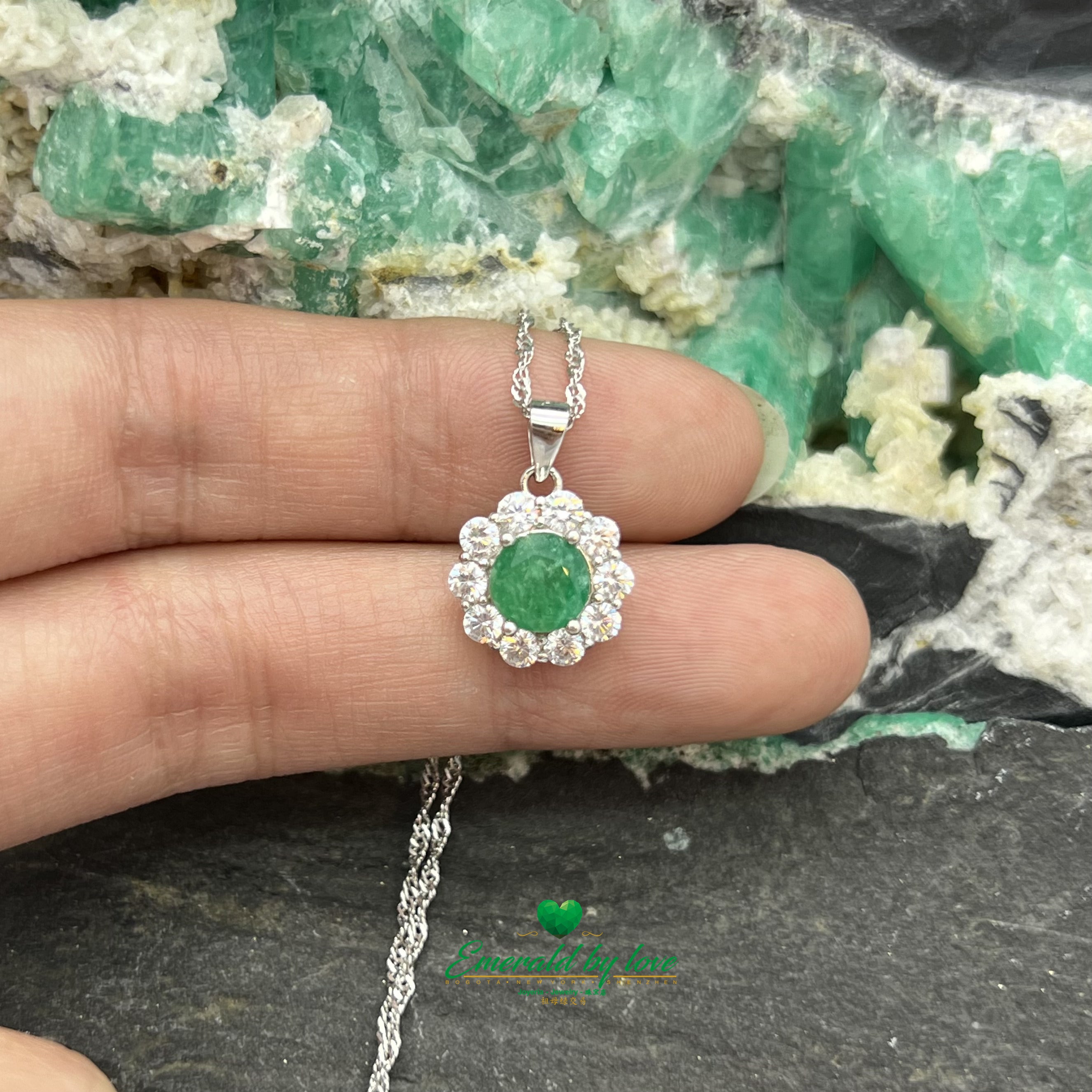 Silver Flower Pendant with Central Round Emerald and White Zircon Petals