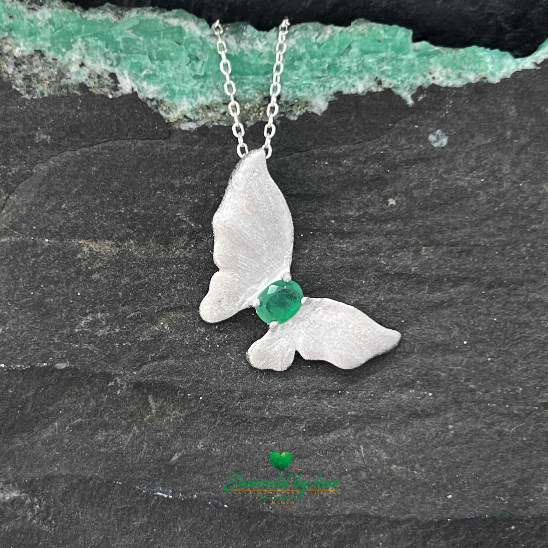 Beautiful Silver Butterfly Pendant with Central Oval Emerald