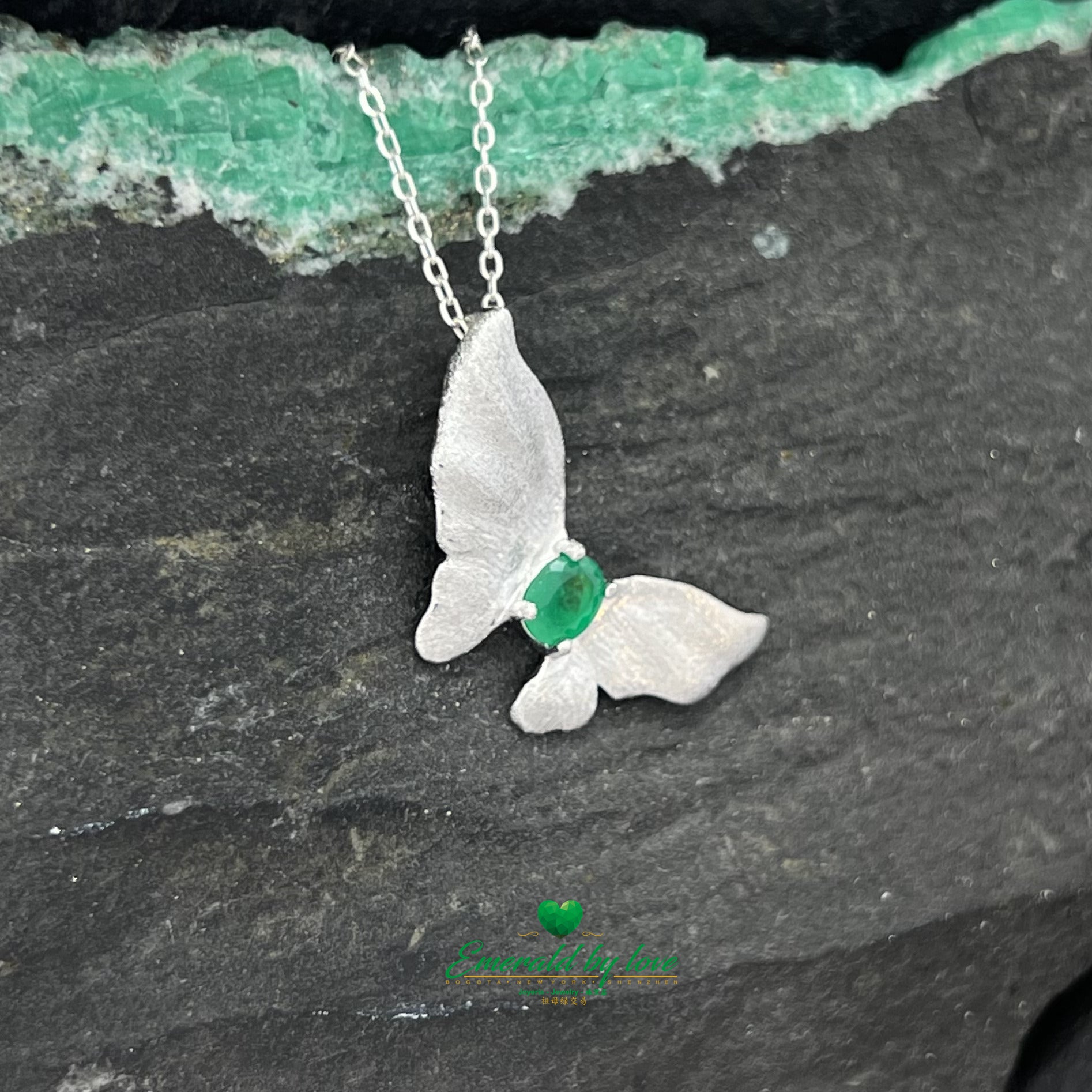 Beautiful Silver Butterfly Pendant with Central Oval Emerald