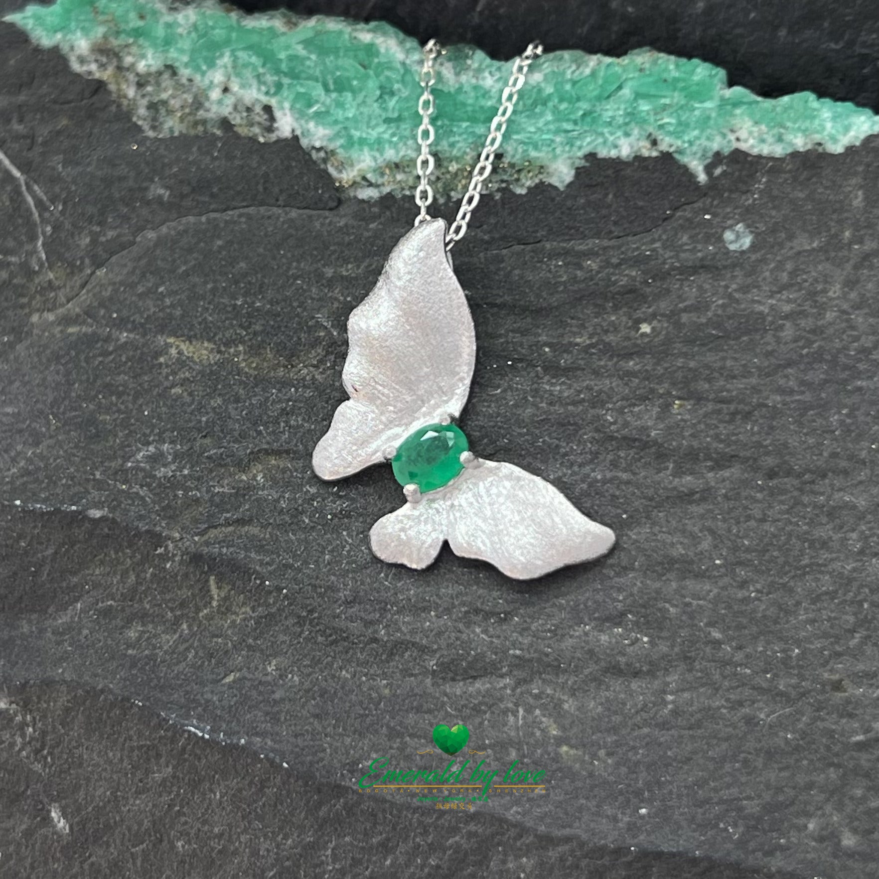 Beautiful Silver Butterfly Pendant with Central Oval Emerald