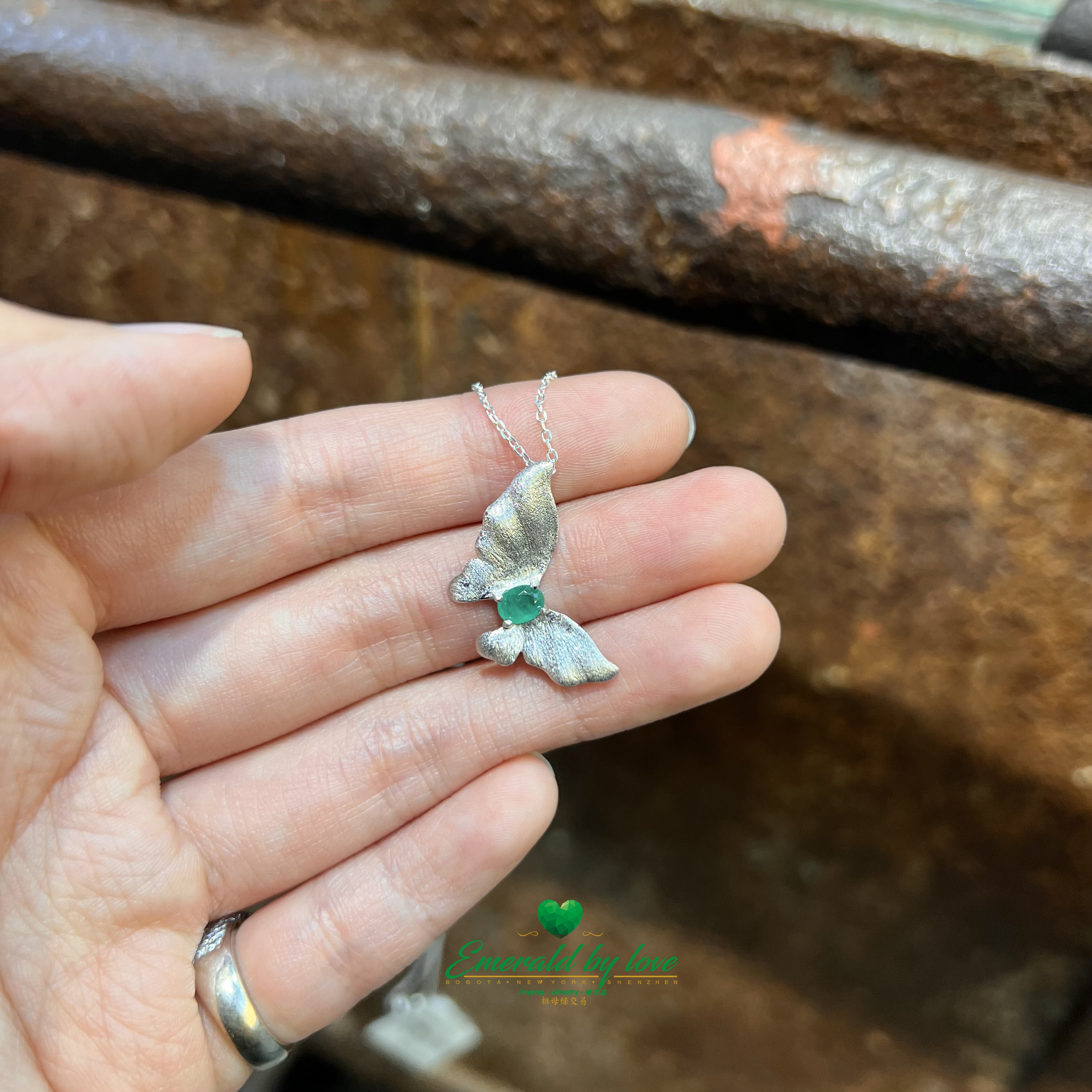 Beautiful Silver Butterfly Pendant with Central Oval Emerald