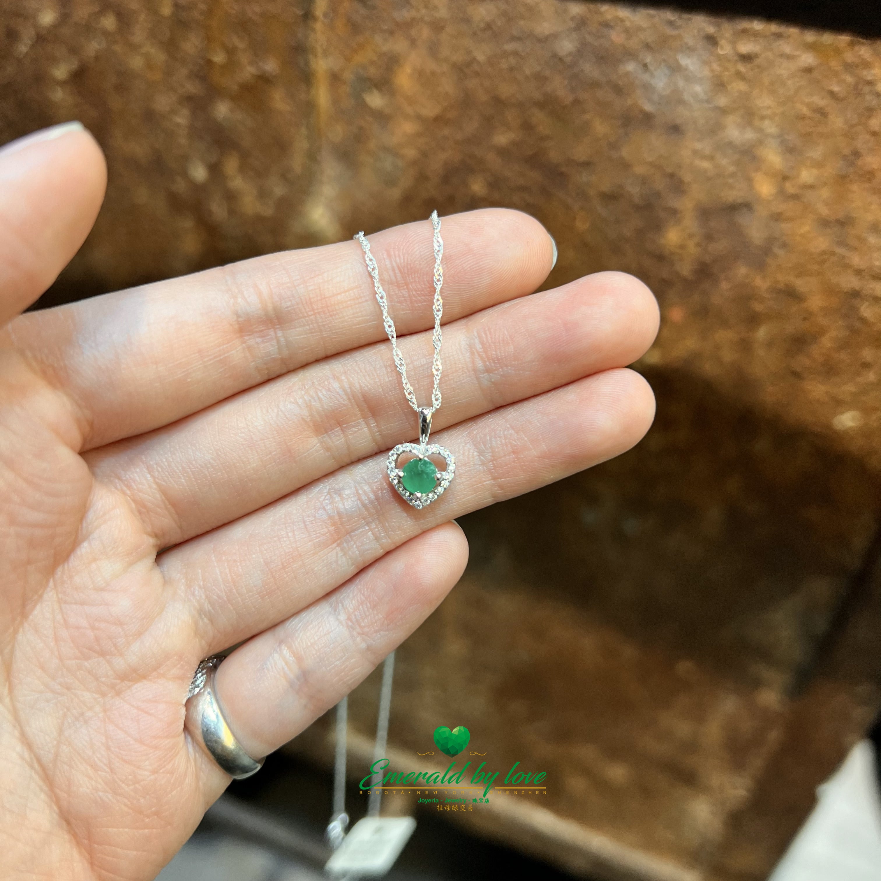 Zircon Heart-Shaped Pendant with Central Round Emerald