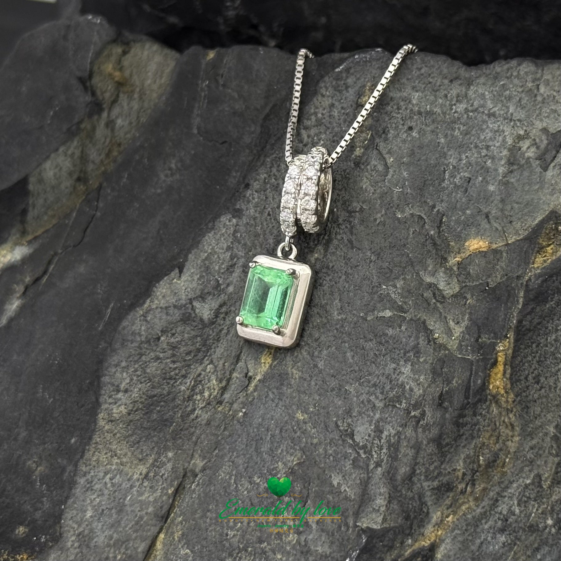 Sterling Silver Chain with Emerald Cut Emerald Pendant and Cubic Zirconia Roll Setting