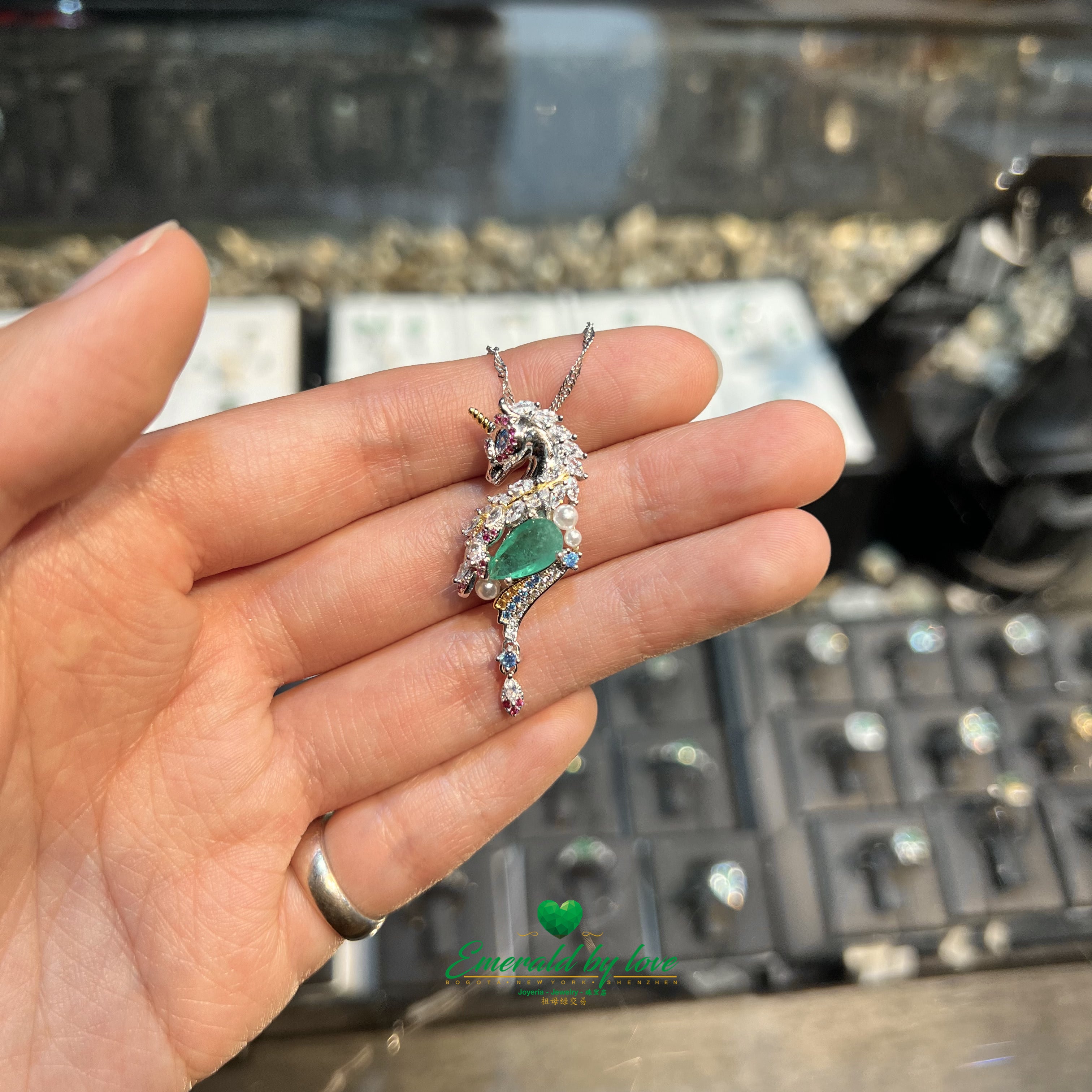 Enchanting Unicorn Pendant with Central Teardrop Colombian Emerald and Multicolor Zirconia