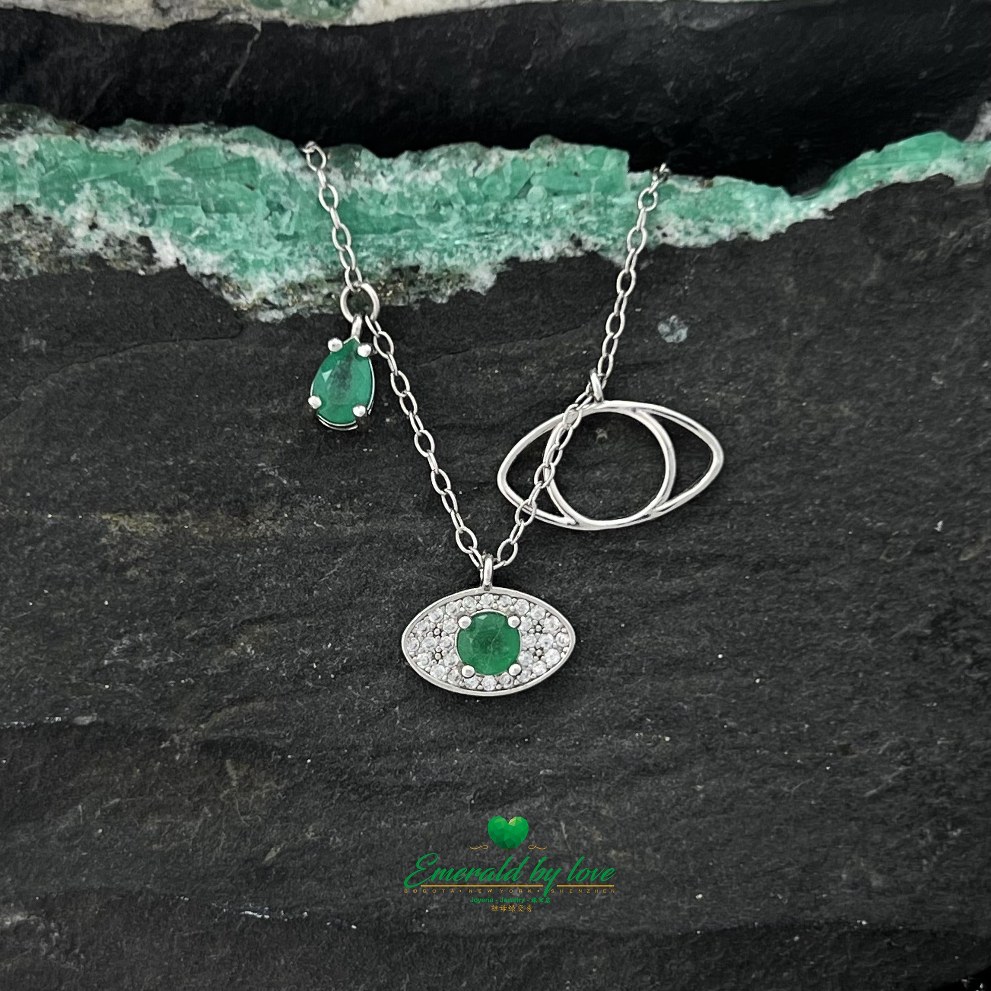 Silver Necklace with Three Eye Pendants, Two Emeralds