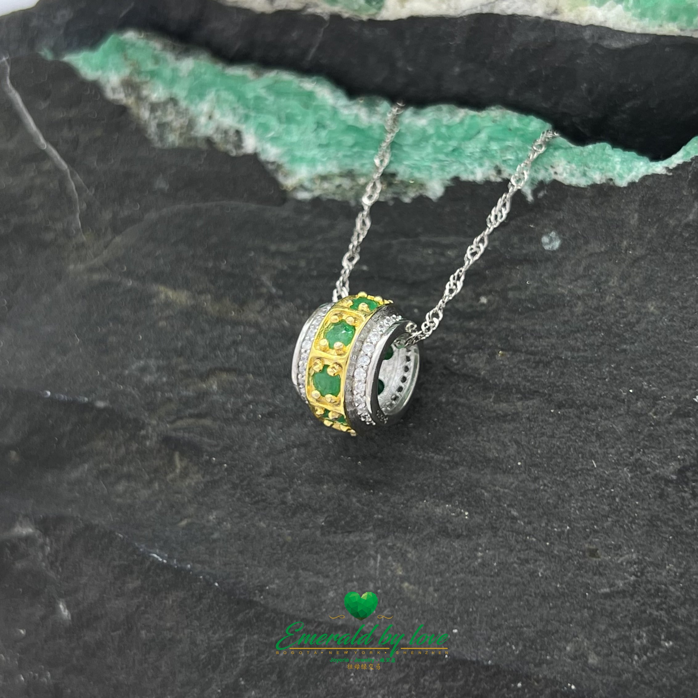 Cylindrical Gold-Plated Pendant with Round Emeralds