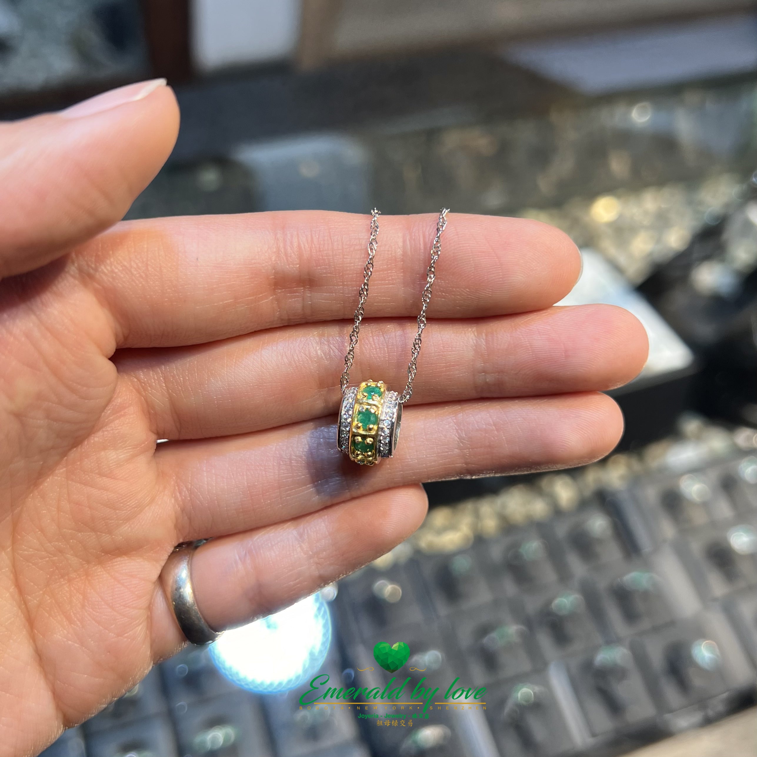 Cylindrical Gold-Plated Pendant with Round Emeralds