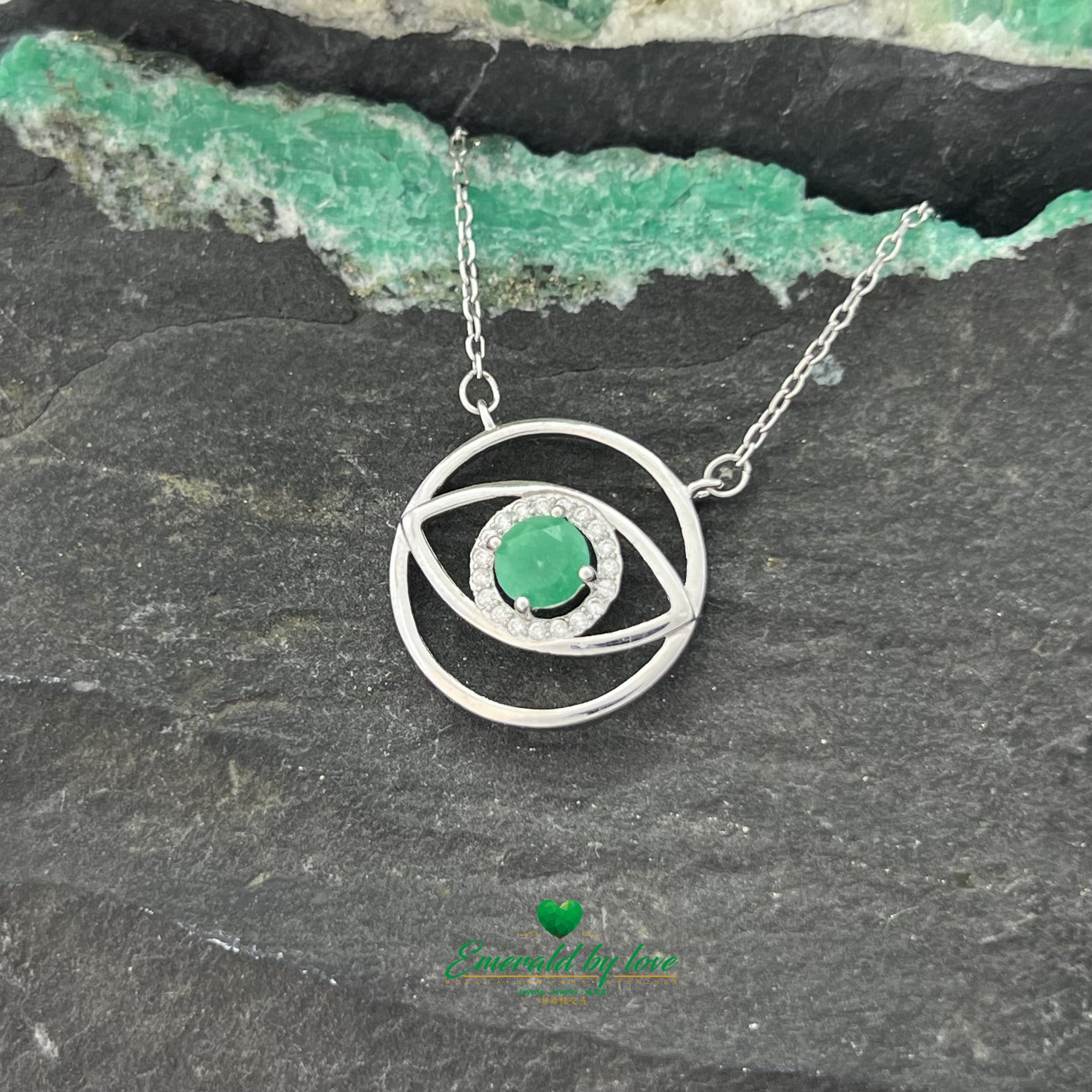 Eye-Shaped Amulet Pendant with Central Round Emerald