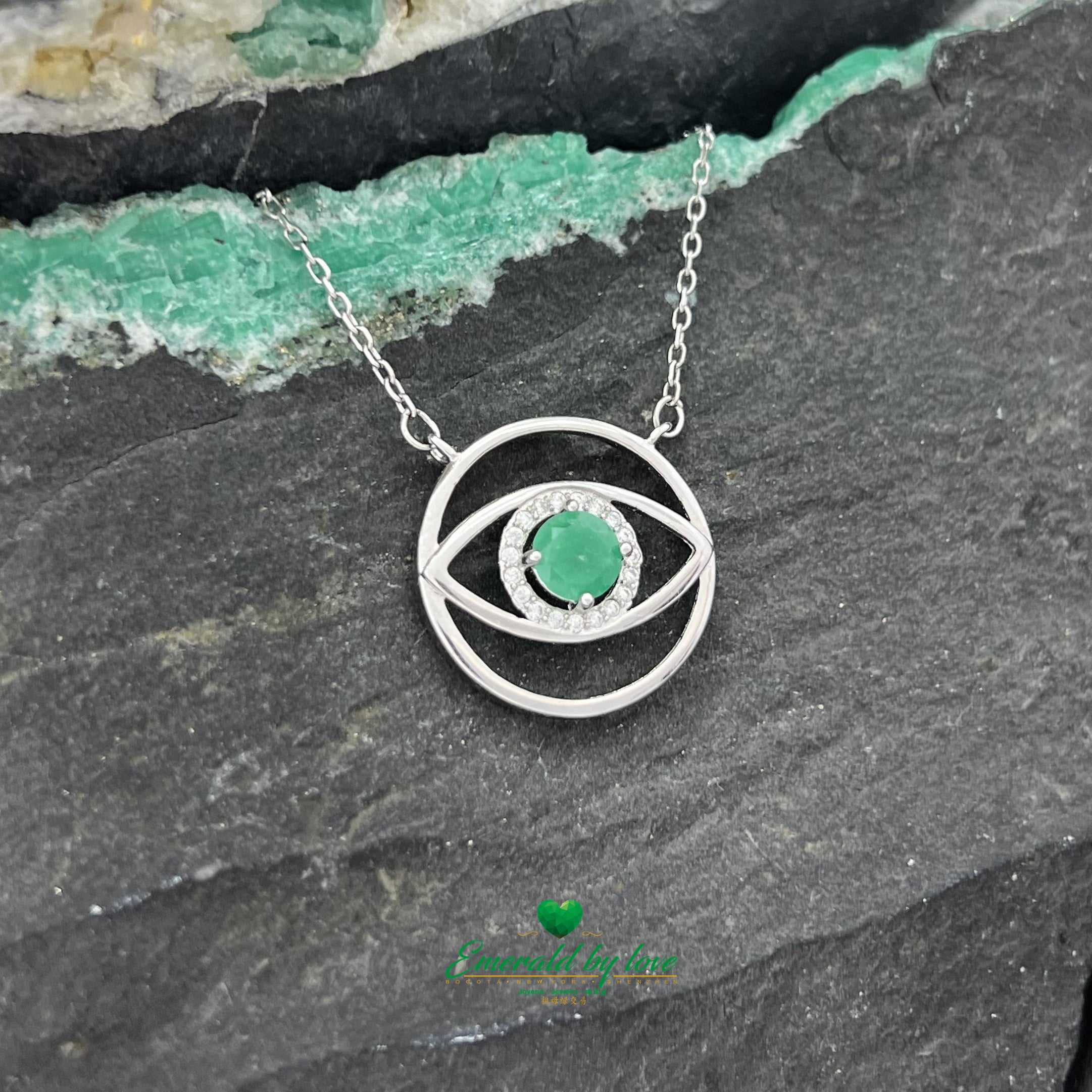 Eye-Shaped Amulet Pendant with Central Round Emerald