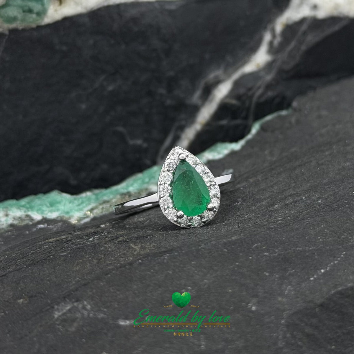 Pear-Cut Emerald Ring Surrounded by Diamonds